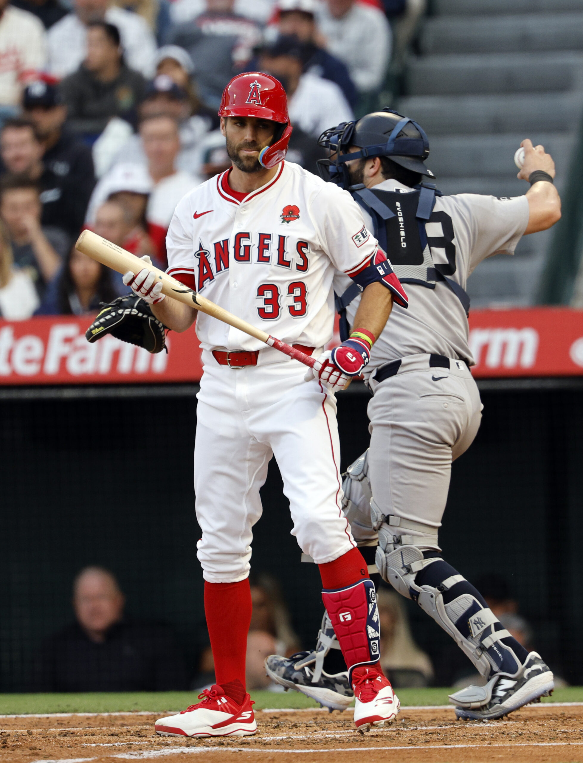 New Angels utility man Chris Taylor reacts after striking out...