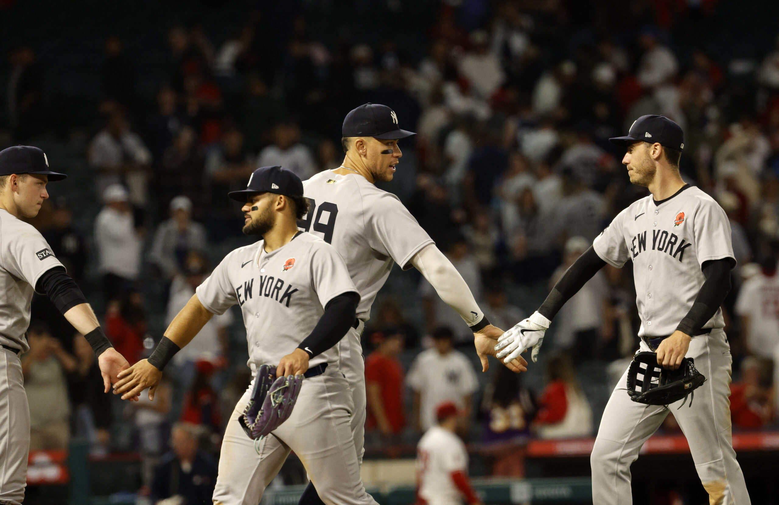 From to right, the New York Yankees’ Ben Rice, Trent...