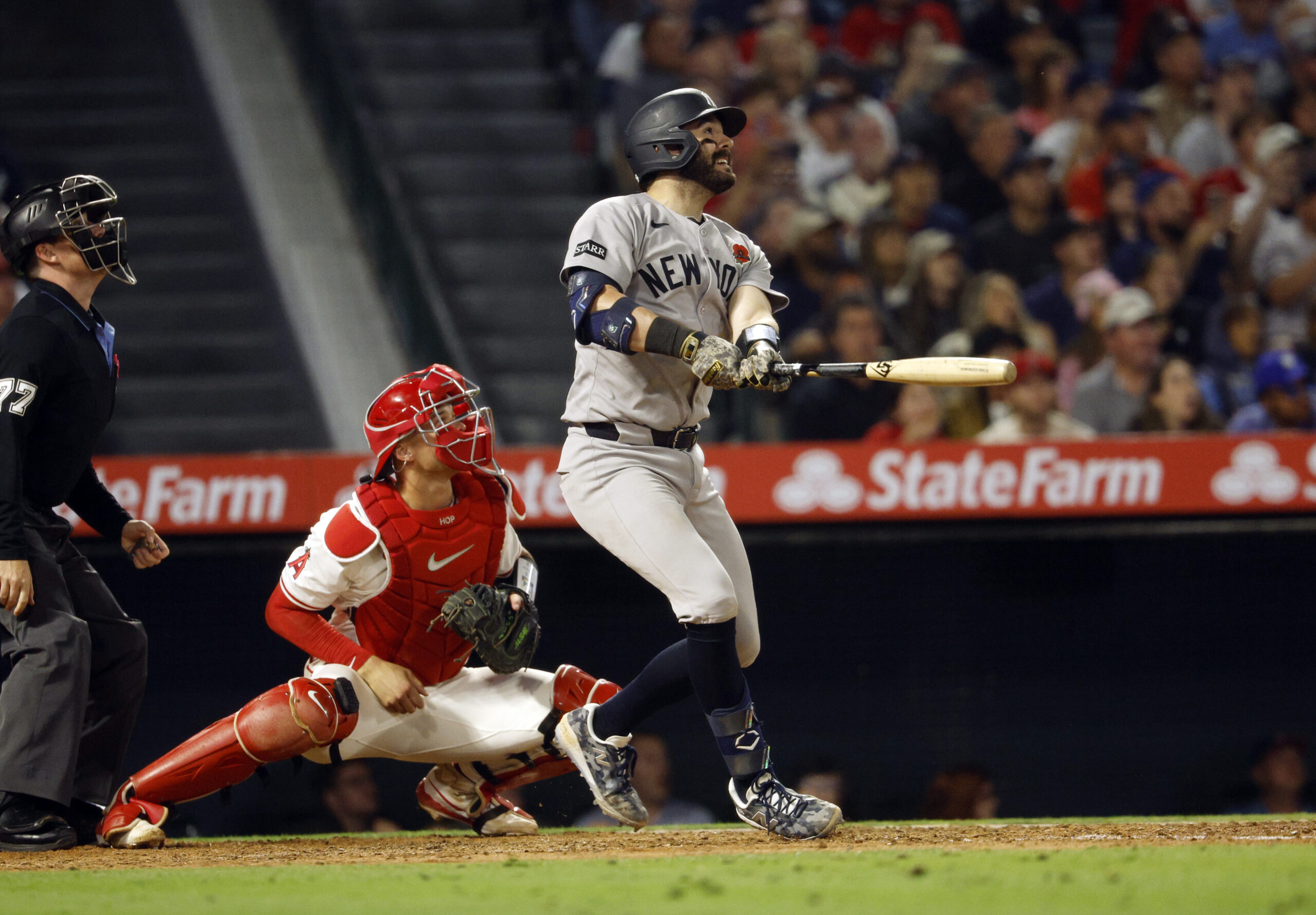 The New York Yankees’ Austin Wells hits a sacrifice fly...