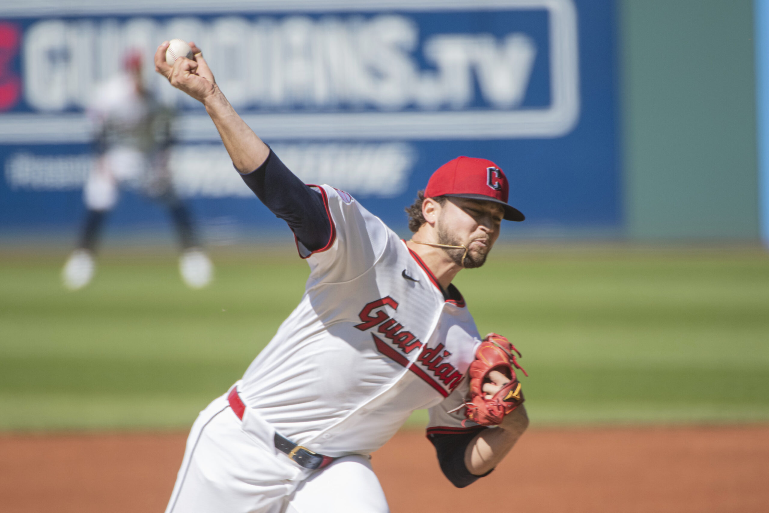 Cleveland Guardians starting pitcher Slade Cecconi delivers against the Angels...