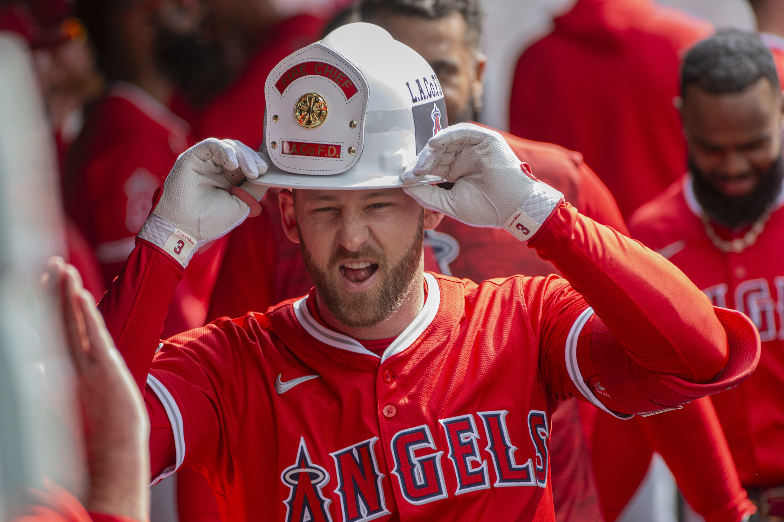Angels’ Taylor Ward celebrates after hitting a solo home run...
