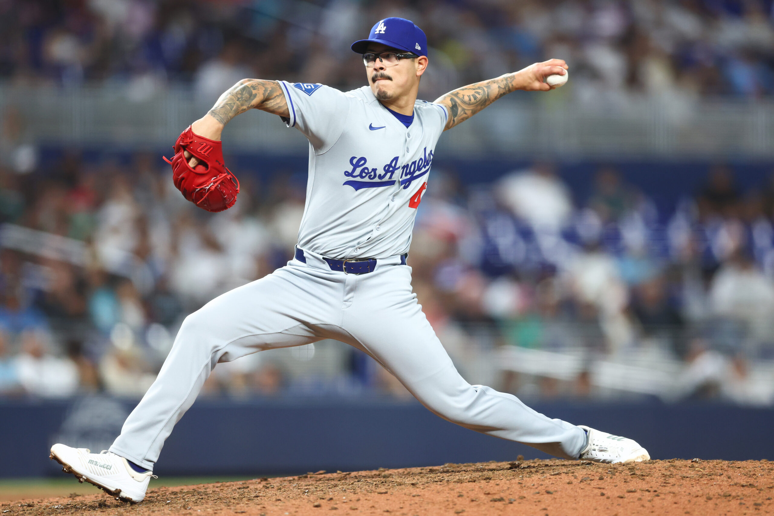 Dodgers relief pitcher Anthony Banda throws to the plate during...