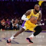 Los Angeles Lakers forward LeBron James (23) controls the ball