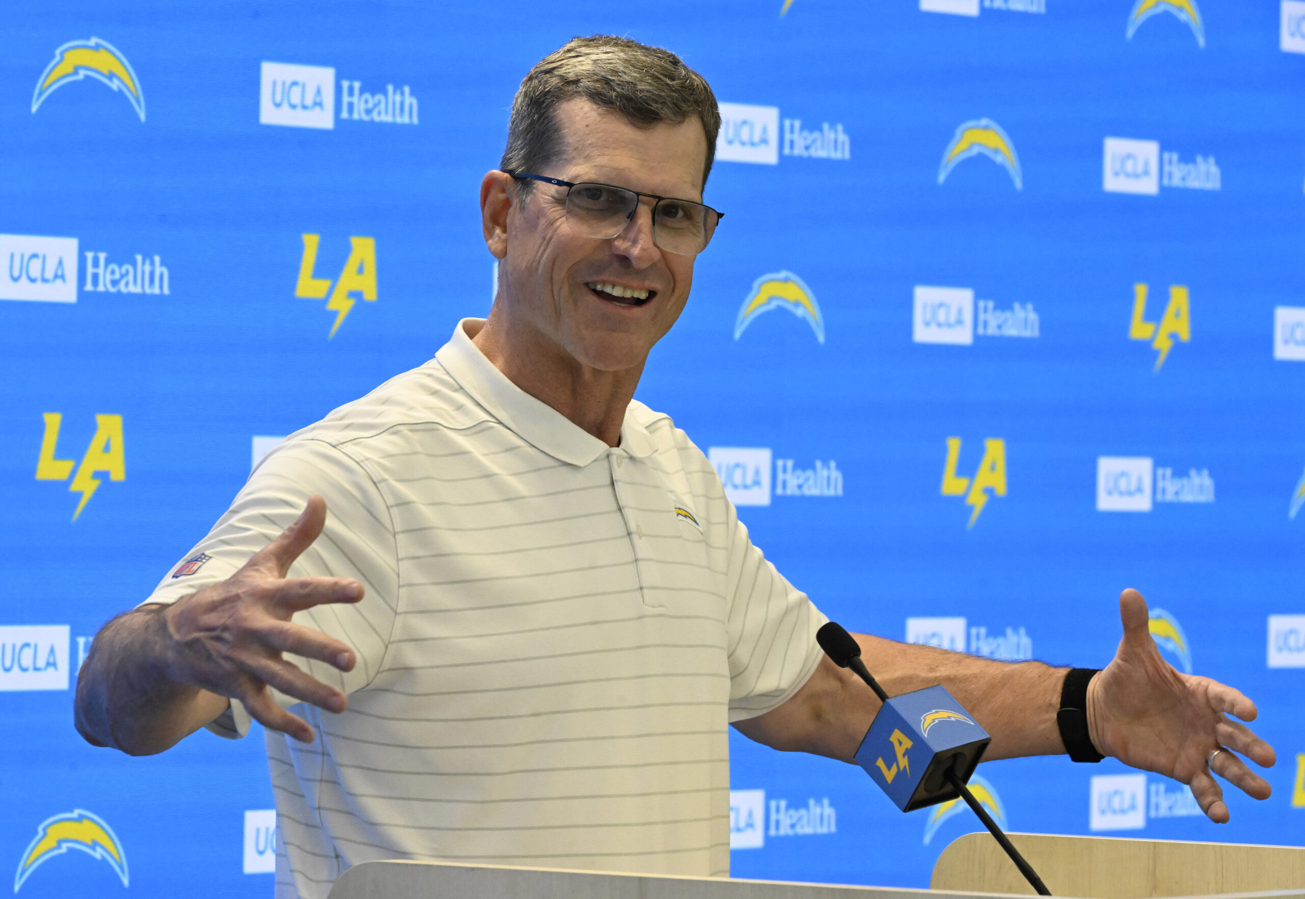 Chargers head coach Jim Harbaugh speaks to the media during...