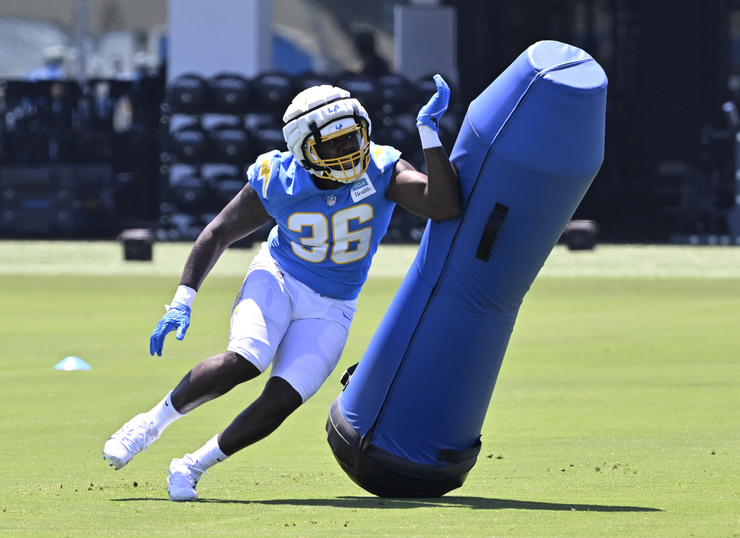 Chargers edge rusher Antonio Doyle goes through drills during a...