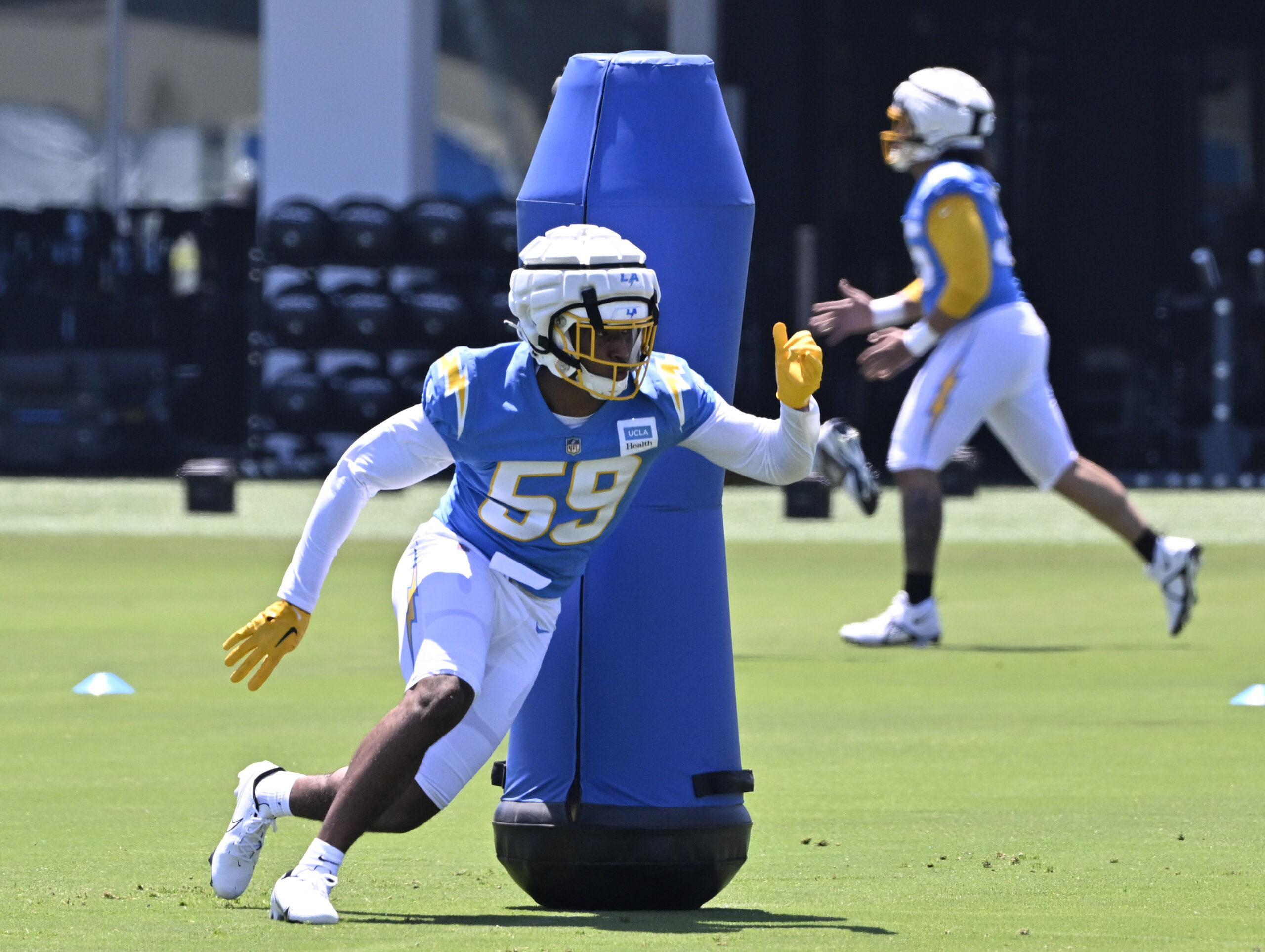 Chargers linebacker Kylan Guidry goes through drills during a rookie...