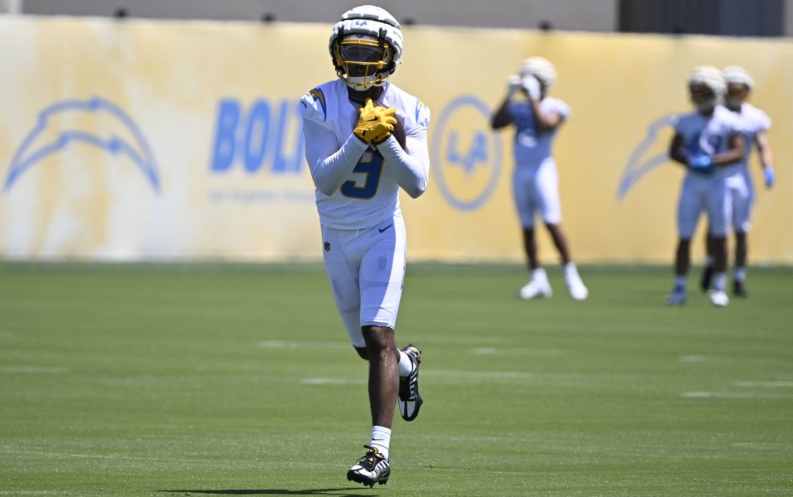 Chargers wide receiver Tre’ Harris goes through drills during a...