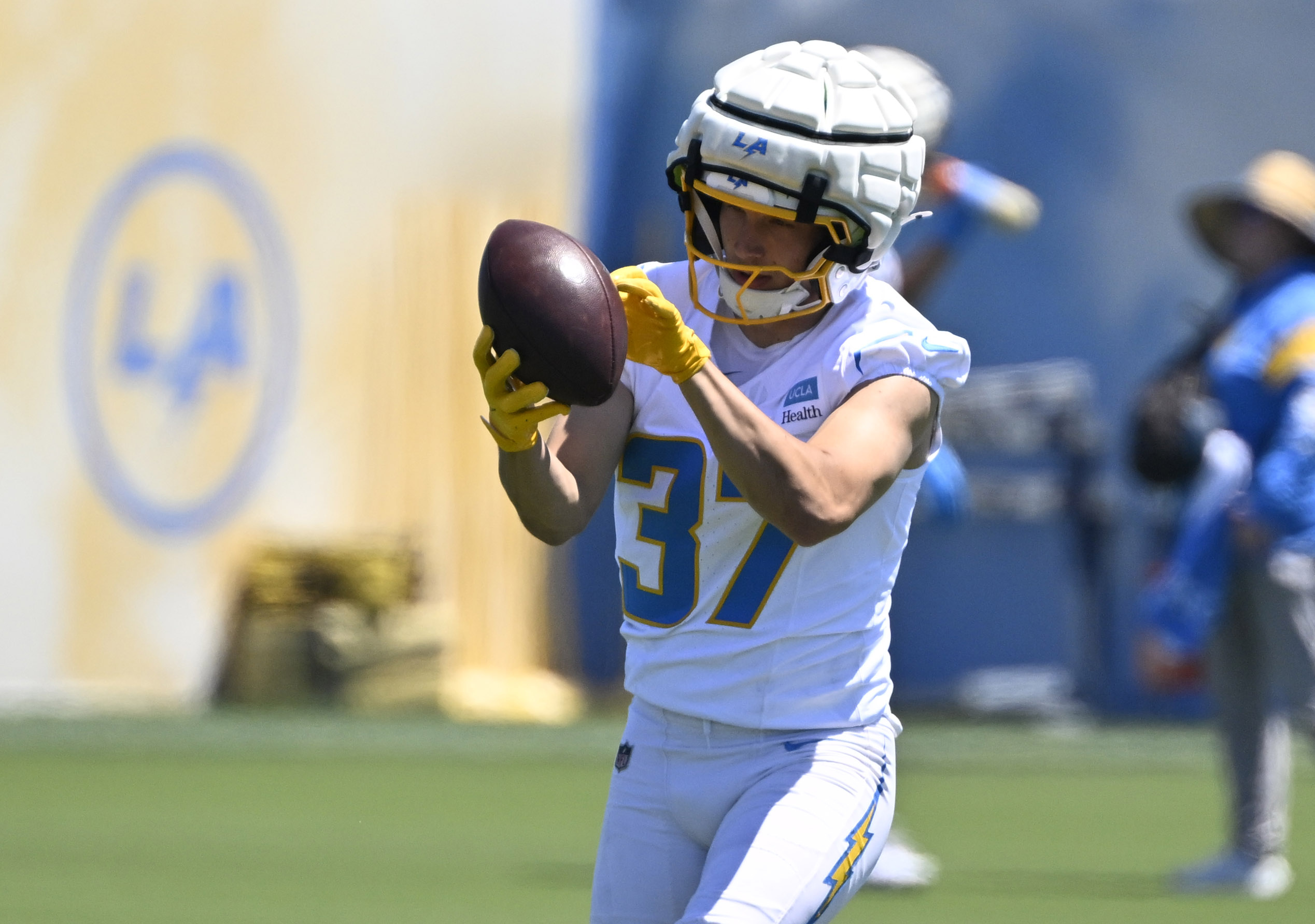 Chargers wide receiver Luke Grimm goes through drills during a...