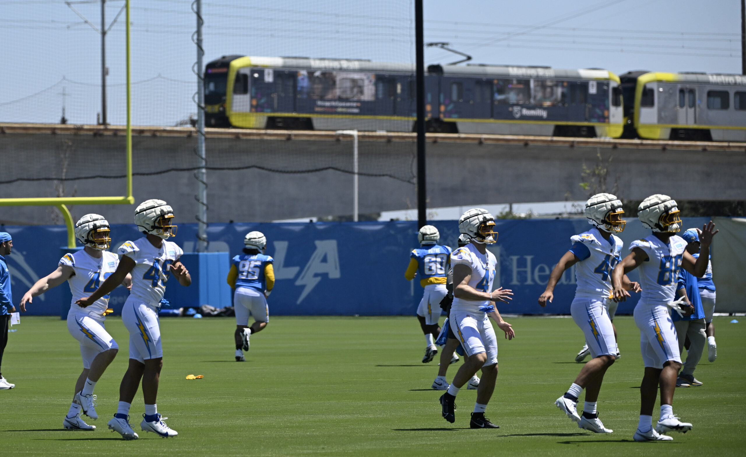 Chargers players go through drills during a rookie minicamp workout...