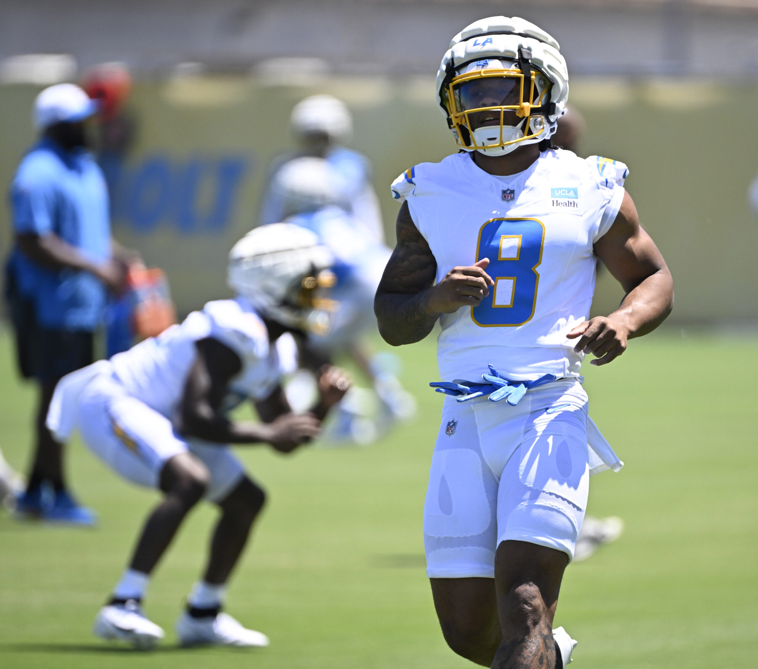 Chargers running back Omarion Hampton goes through drills during a...