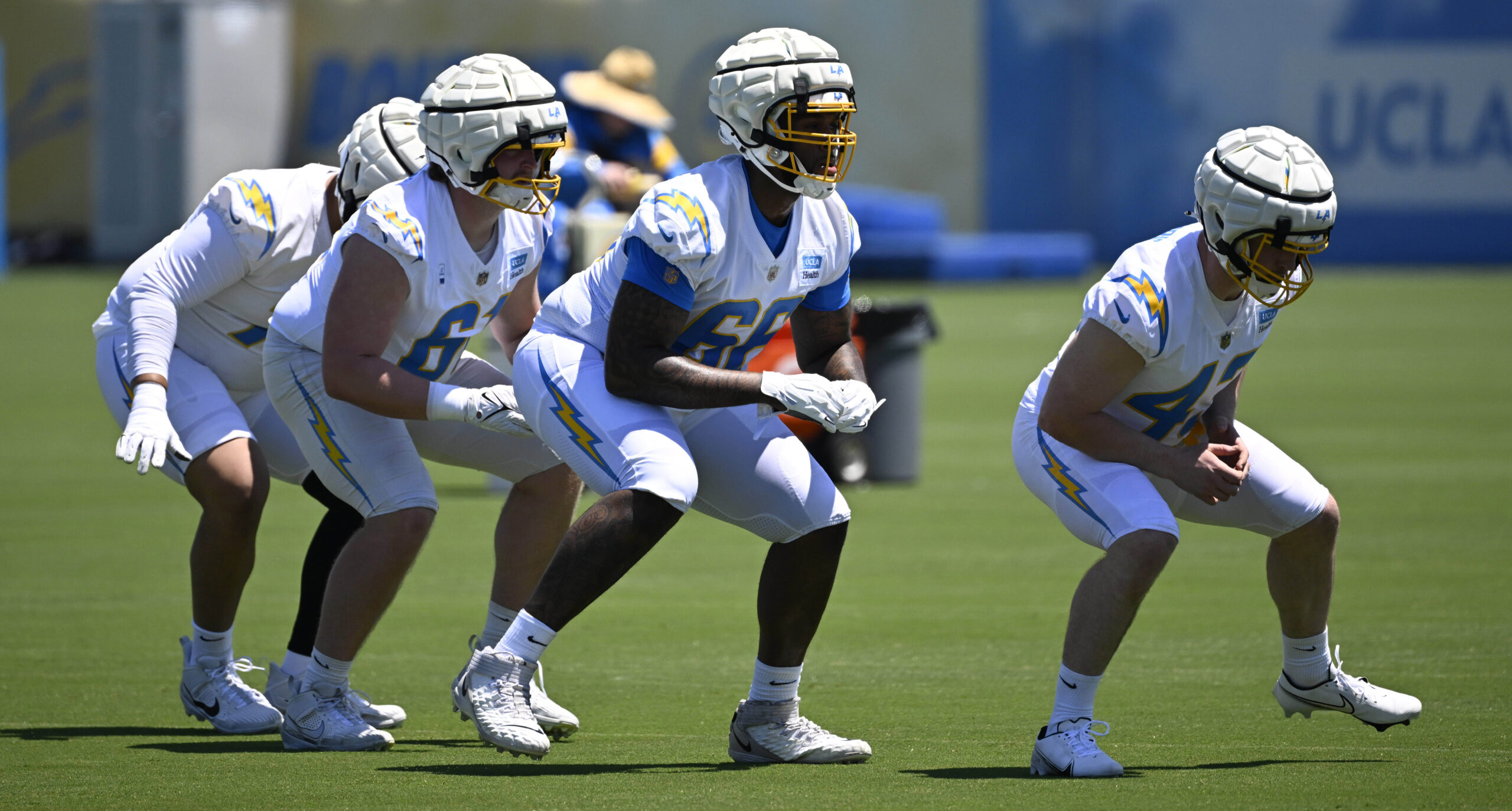Chargers players go through drills during a rookie minicamp workout...