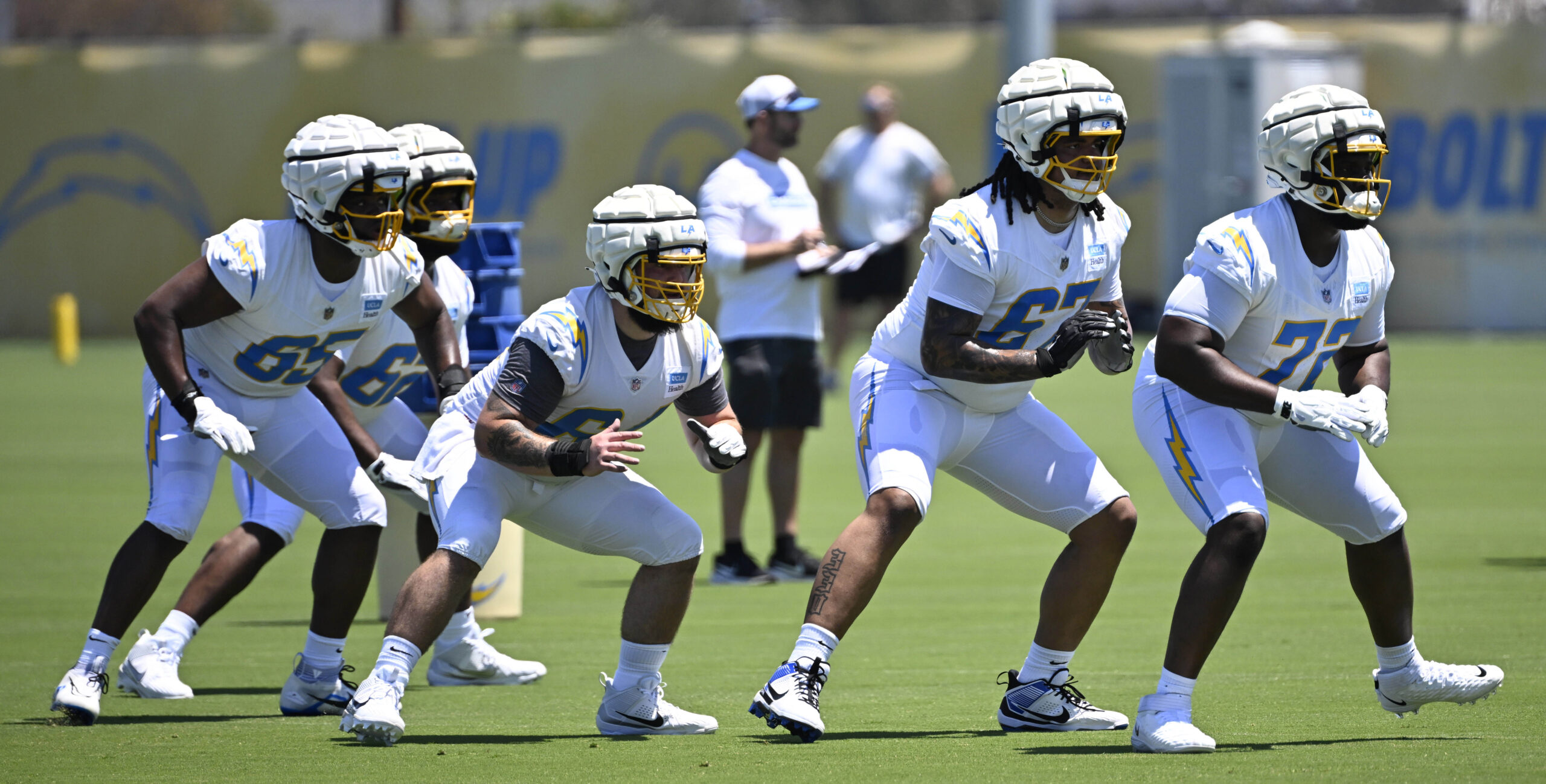 Chargers players go through drills during a rookie minicamp workout...