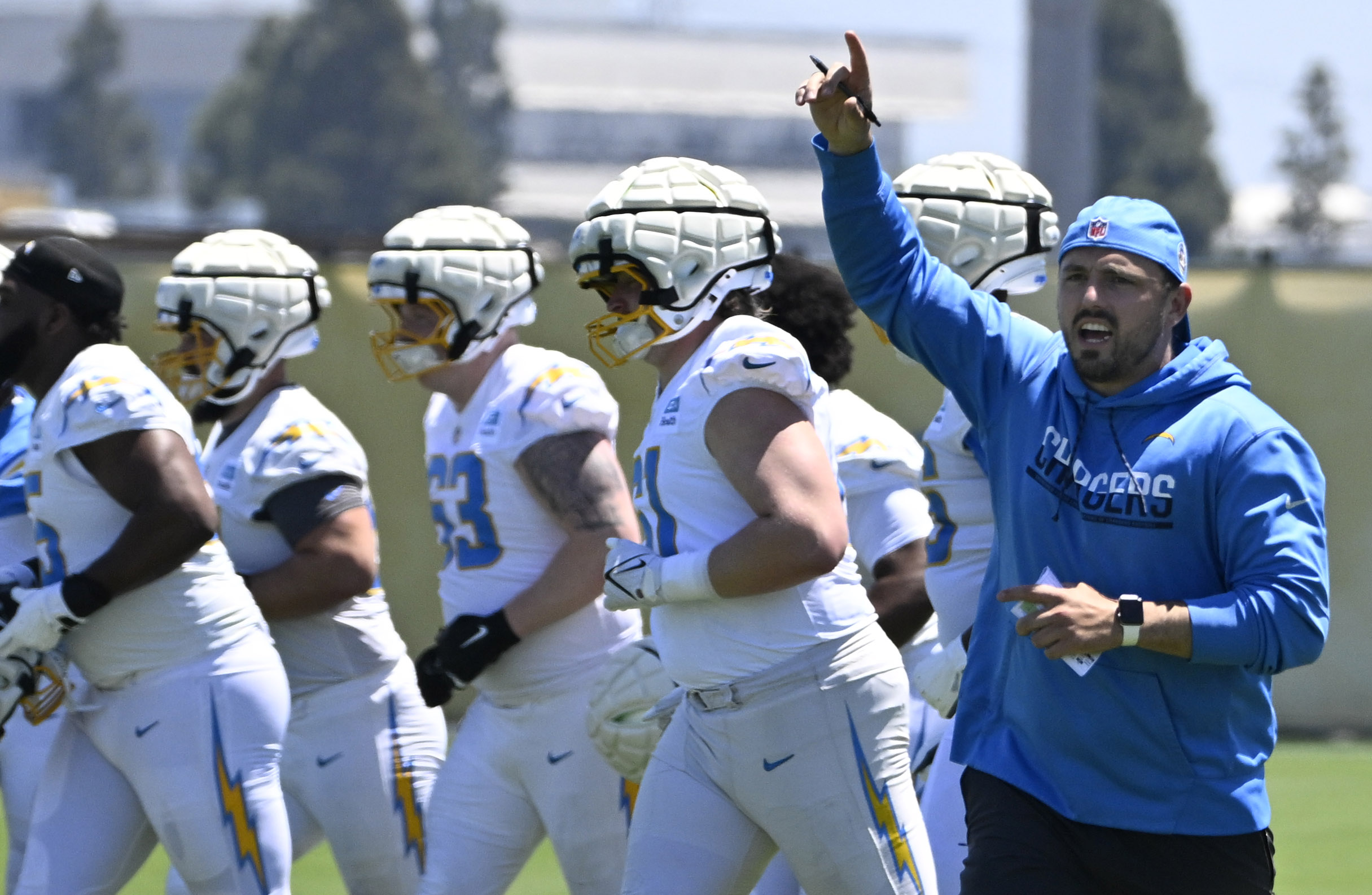 Chargers players go through drills during a rookie minicamp workout...