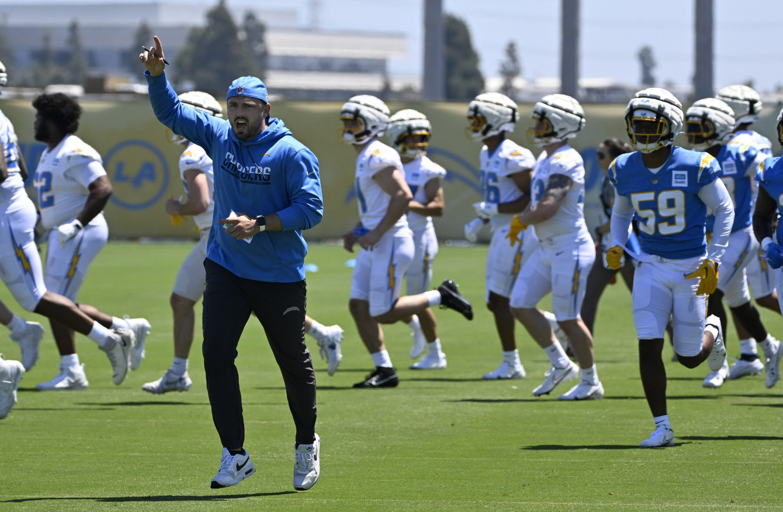 Chargers players go through drills during a rookie minicamp workout...