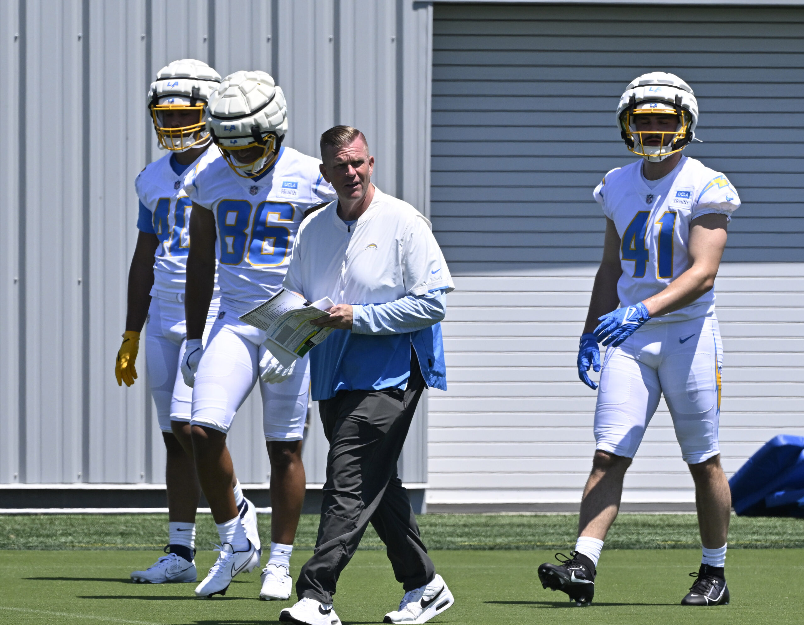 Chargers players go through drills during a rookie minicamp workout...