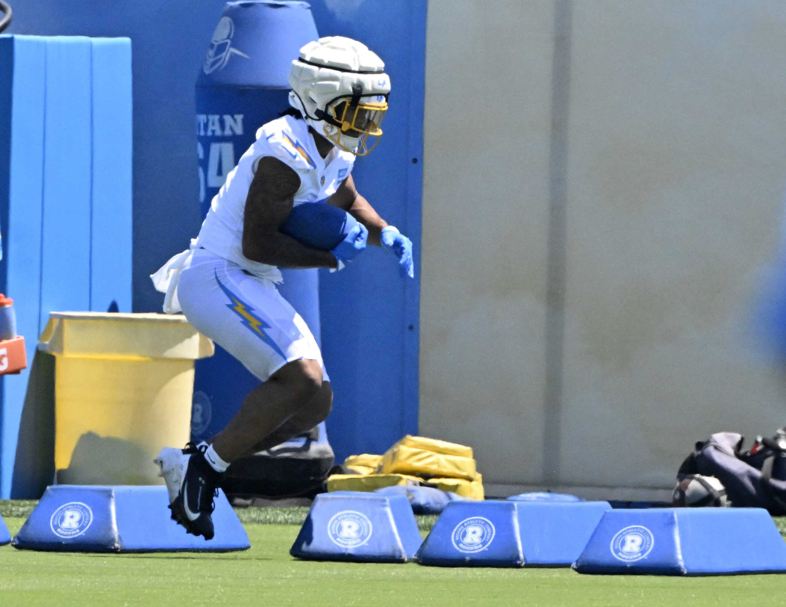 Chargers running back Omarion Hampton goes through drills during a...