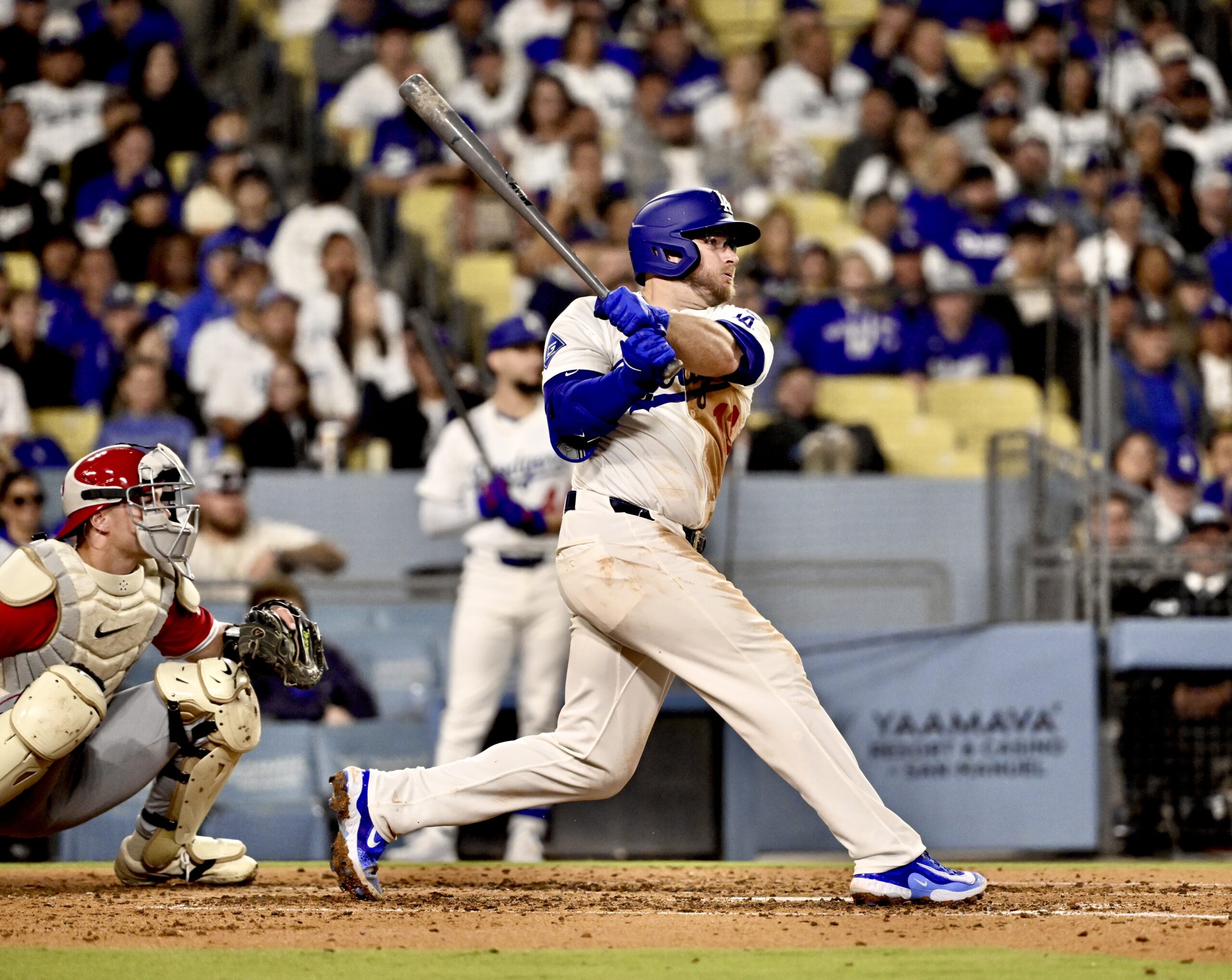 Max Muncy #13 of the Los Angeles Dodgers hits a...