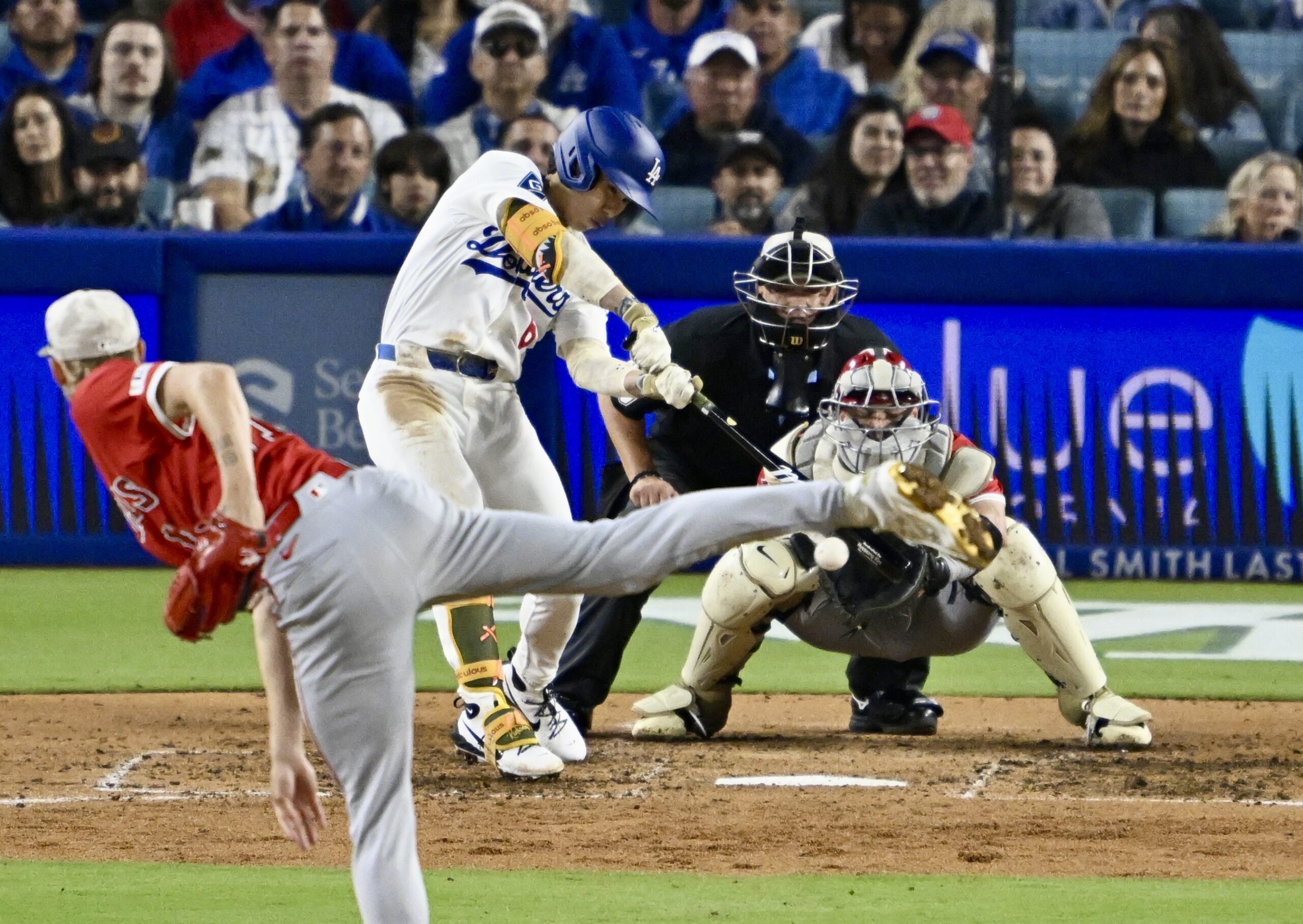 Hyeseong Kim #6 of the Los Angeles Dodgers singles against...