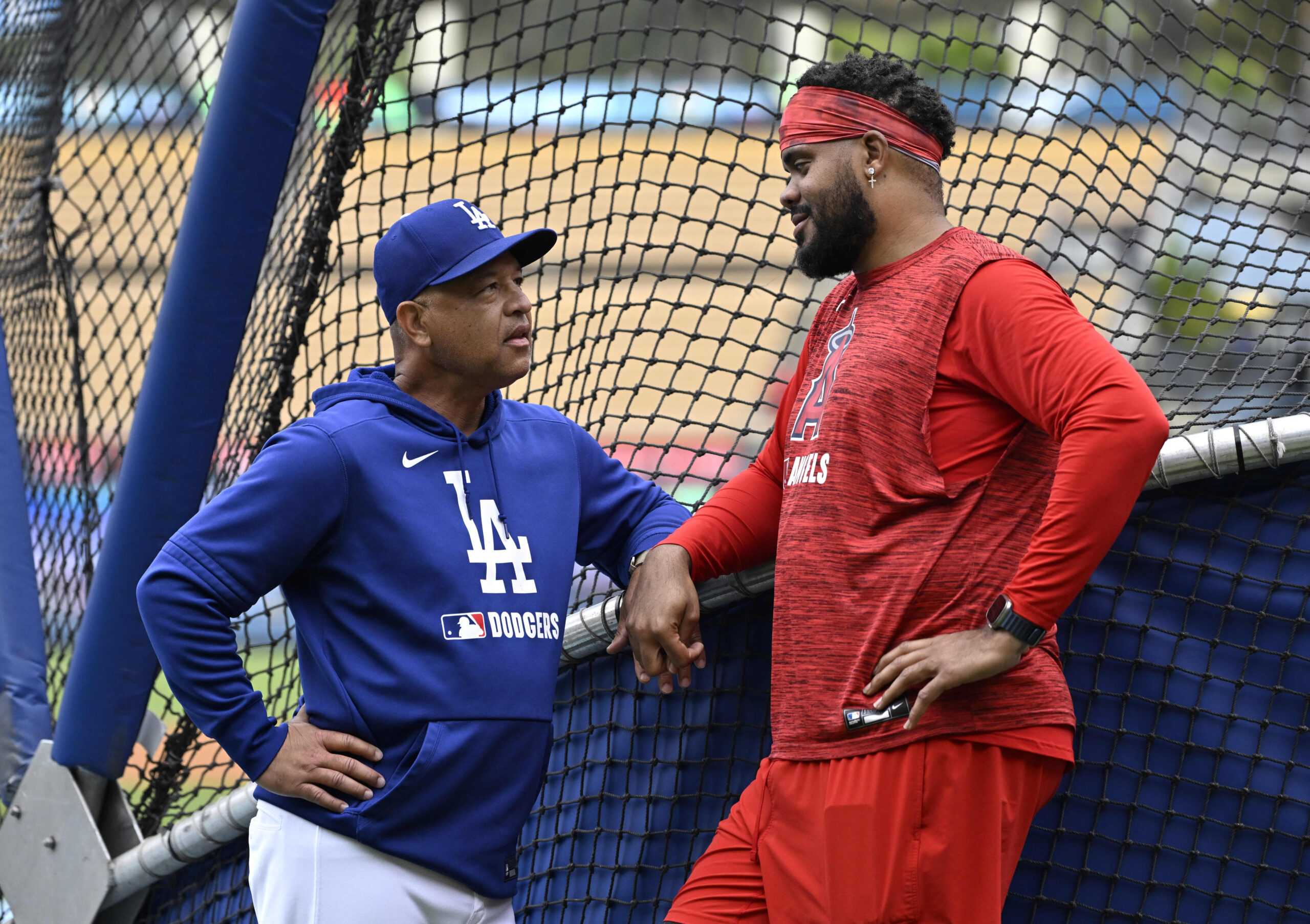 Manager Dave Roberts of the Dodgers talks with Kenley Jansen...