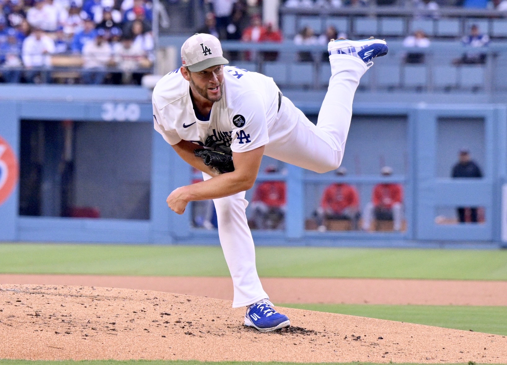 Starting pitcher Clayton Kershaw #22 of the Dodgers throws to...