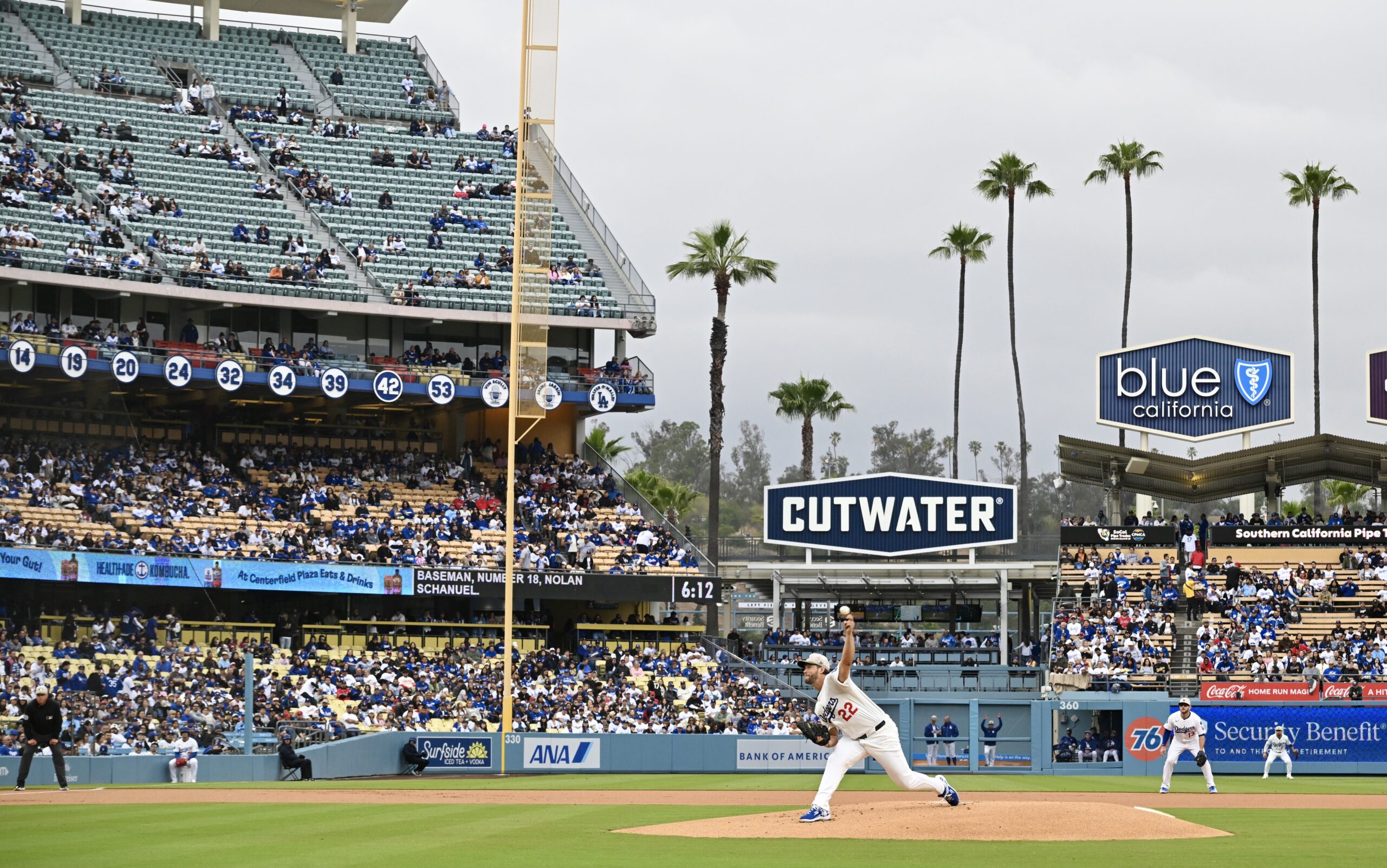 Starting pitcher Clayton Kershaw #22 of the Dodgers throws to...