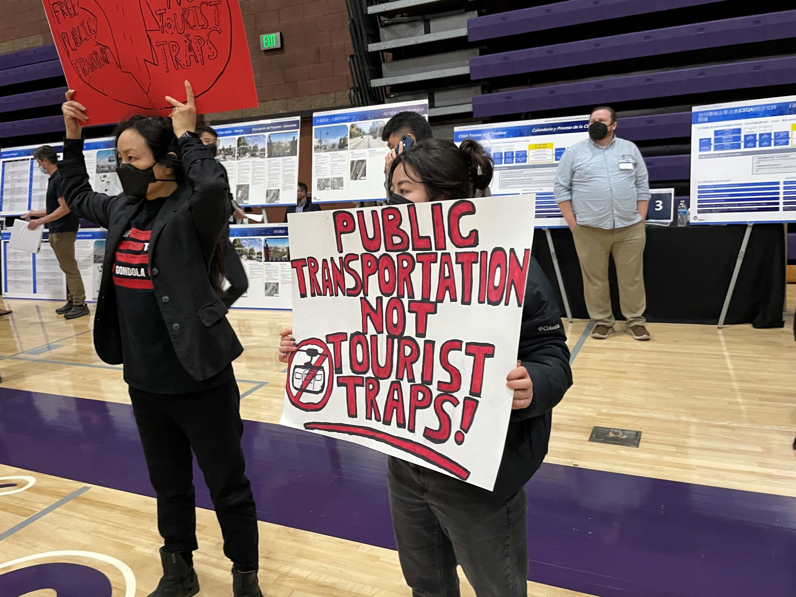 Two protesters with the Stop The Gondola group hold up...