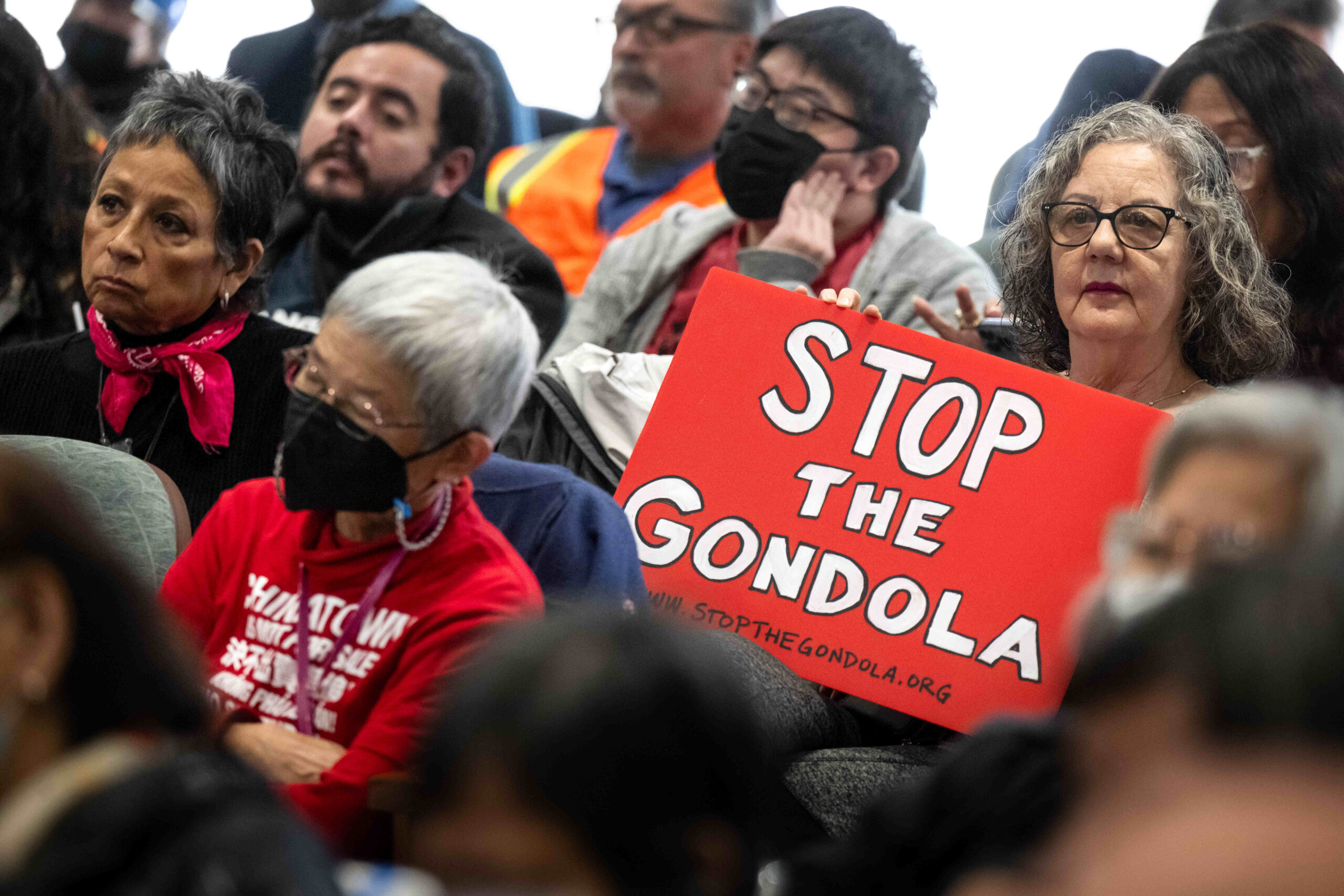 People protest Frank McCourt’s Dodger Stadium gondola project during the...
