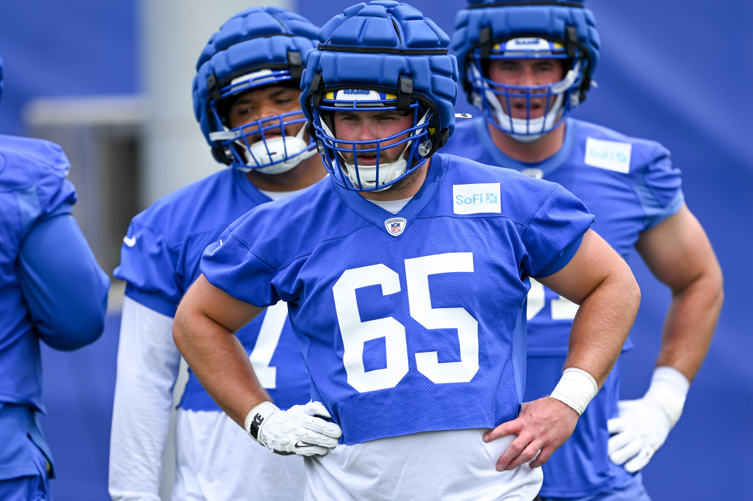 Rams guard Coleman Shelton looks on during an OTA workout...