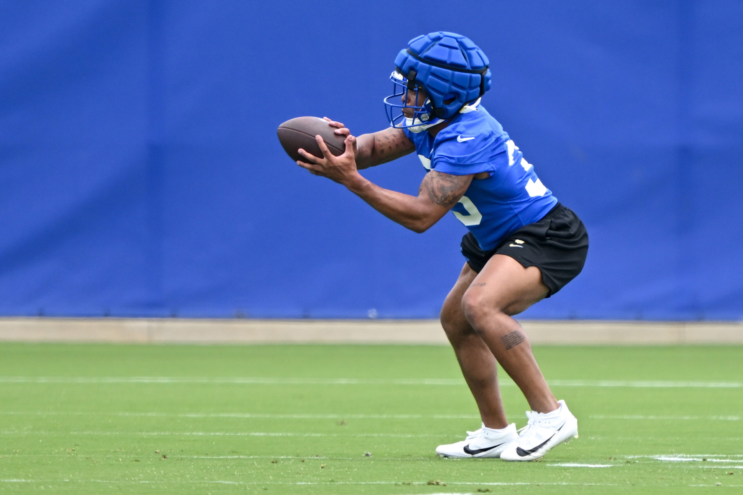 Rams running back Jarquez Hunter catches a ball during an...