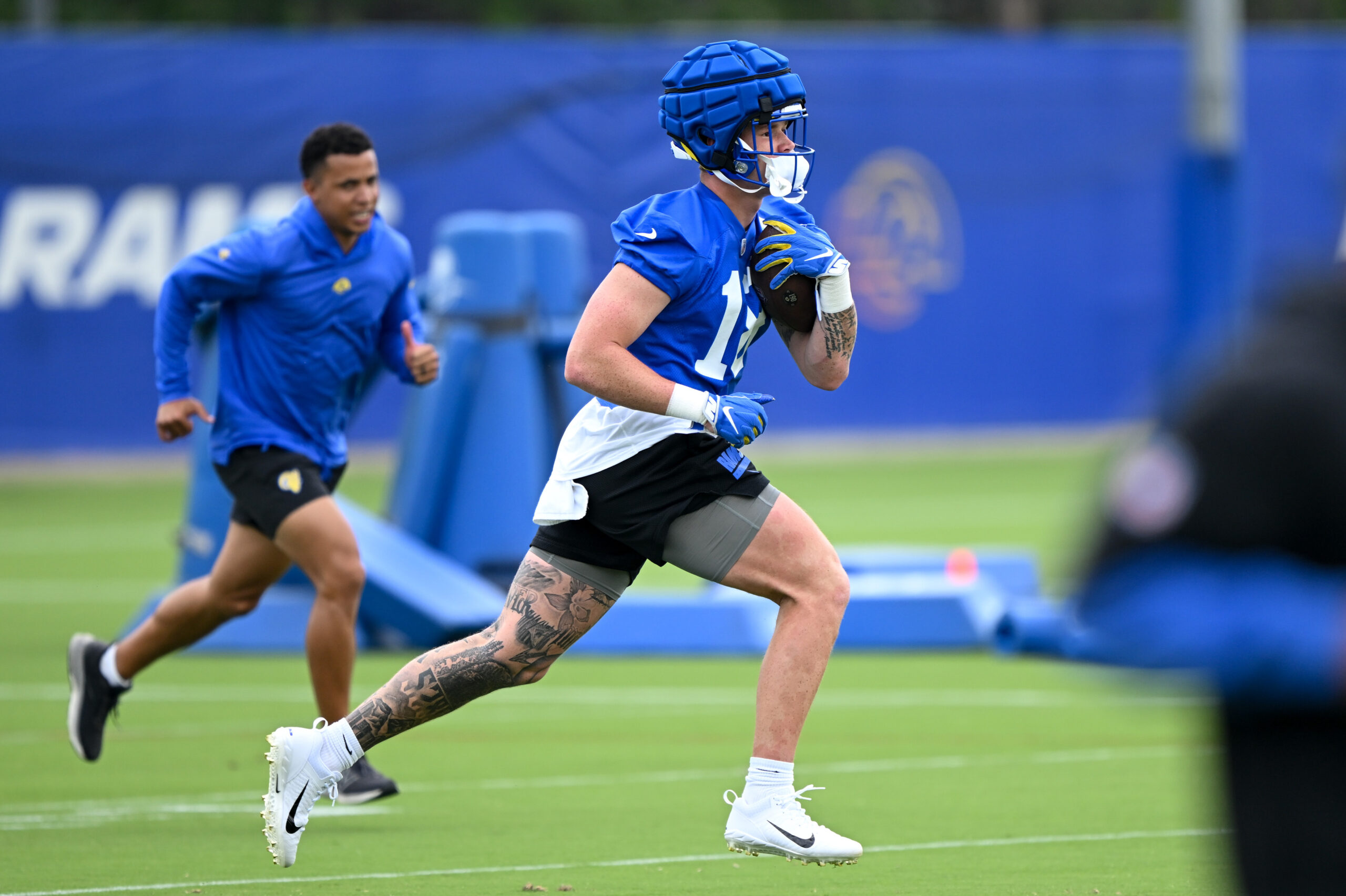 Rams tight end Terrance Ferguson runs with the ball during...