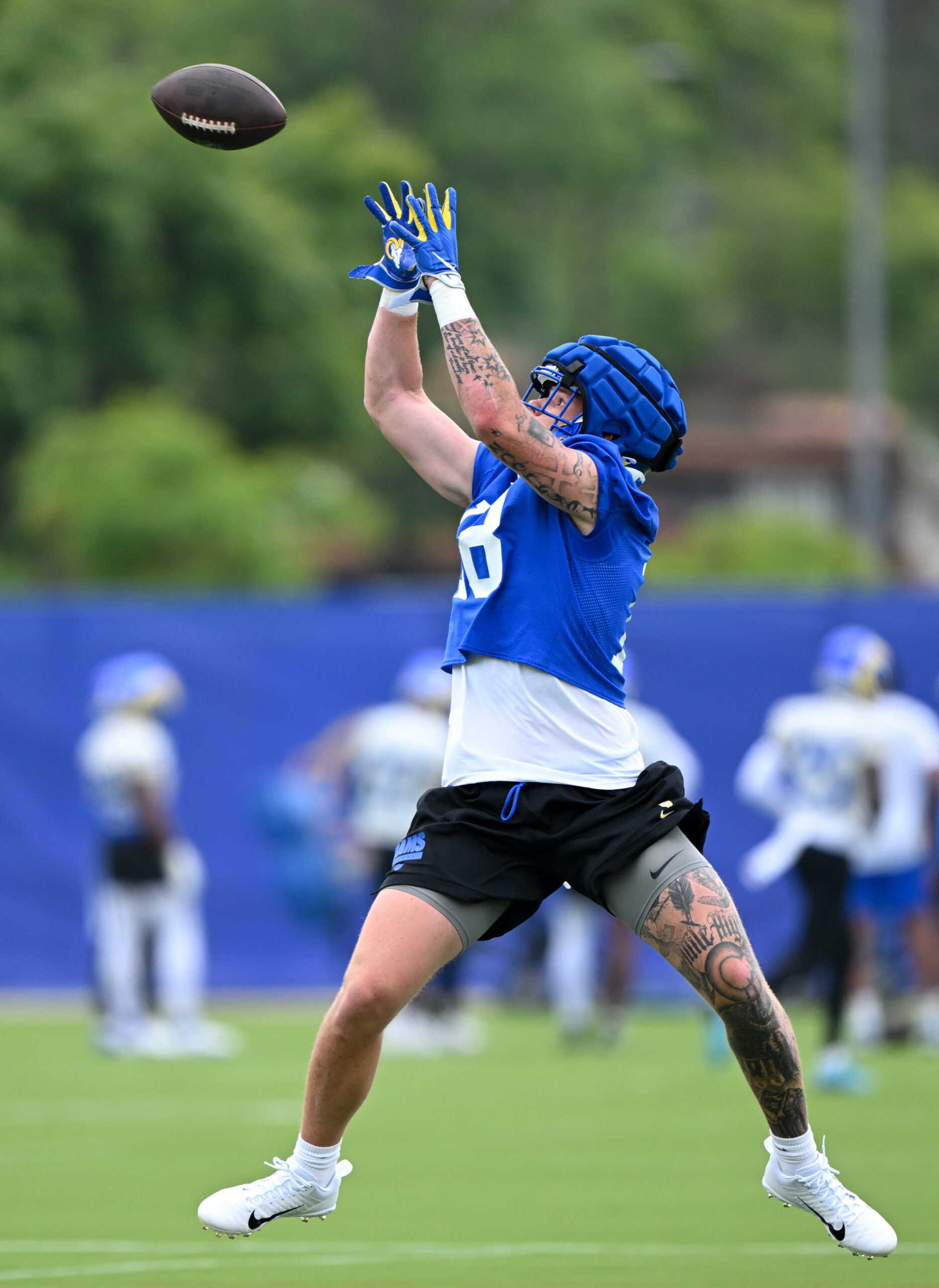 Rams tight end Terrance Ferguson leaps to catch a pass...