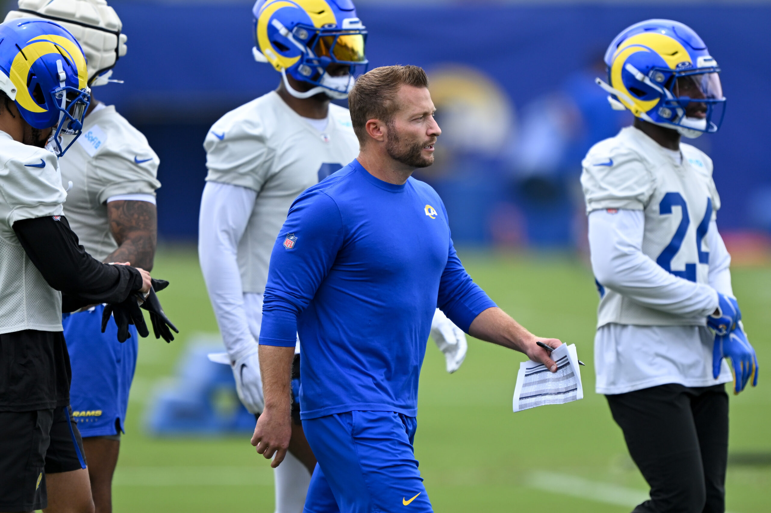 Rams head coach Sean McVay walks on the field during...