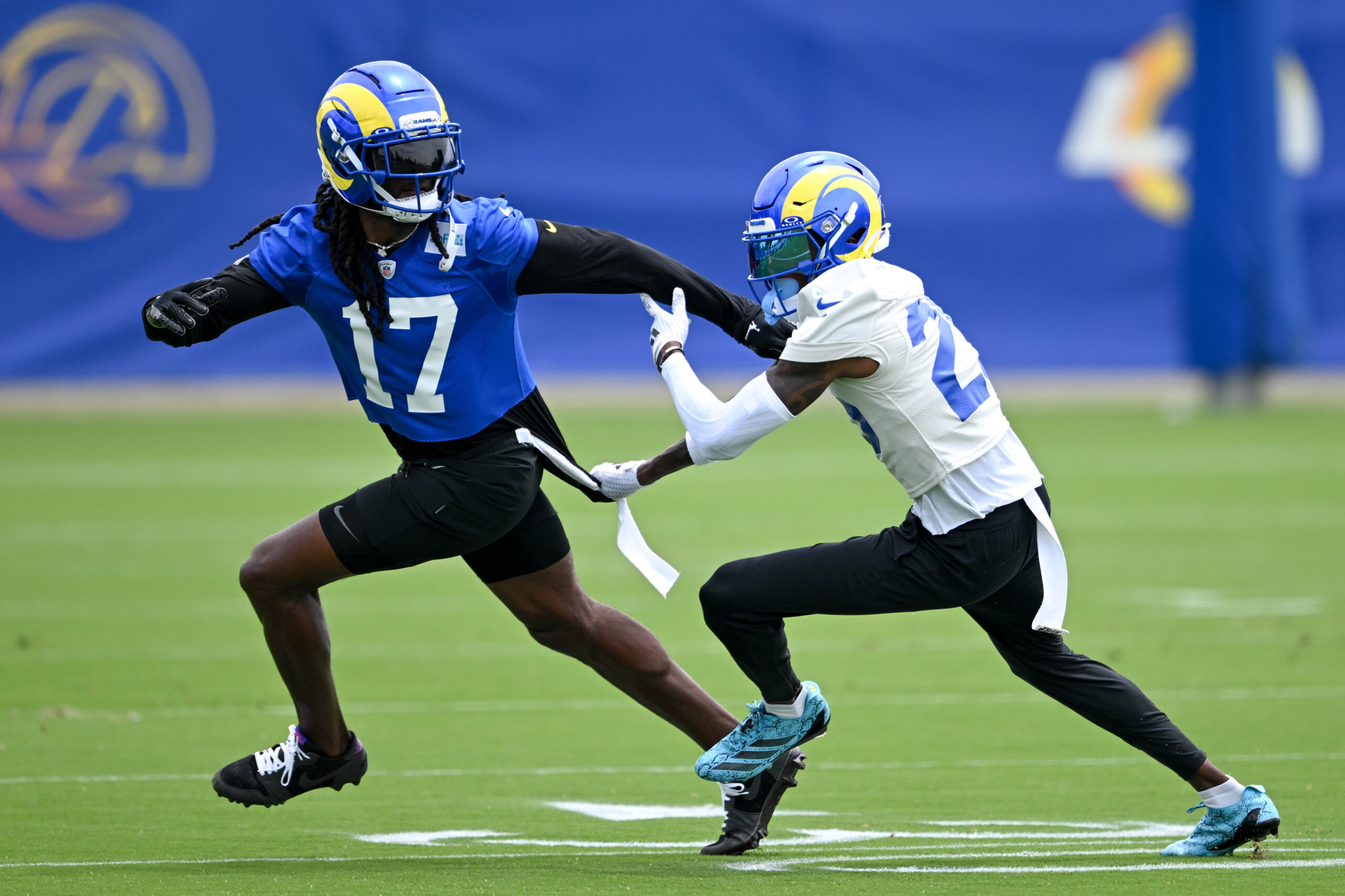 Rams cornerback Emmanuel Forbes, right, and wide receiver Davante Adams...