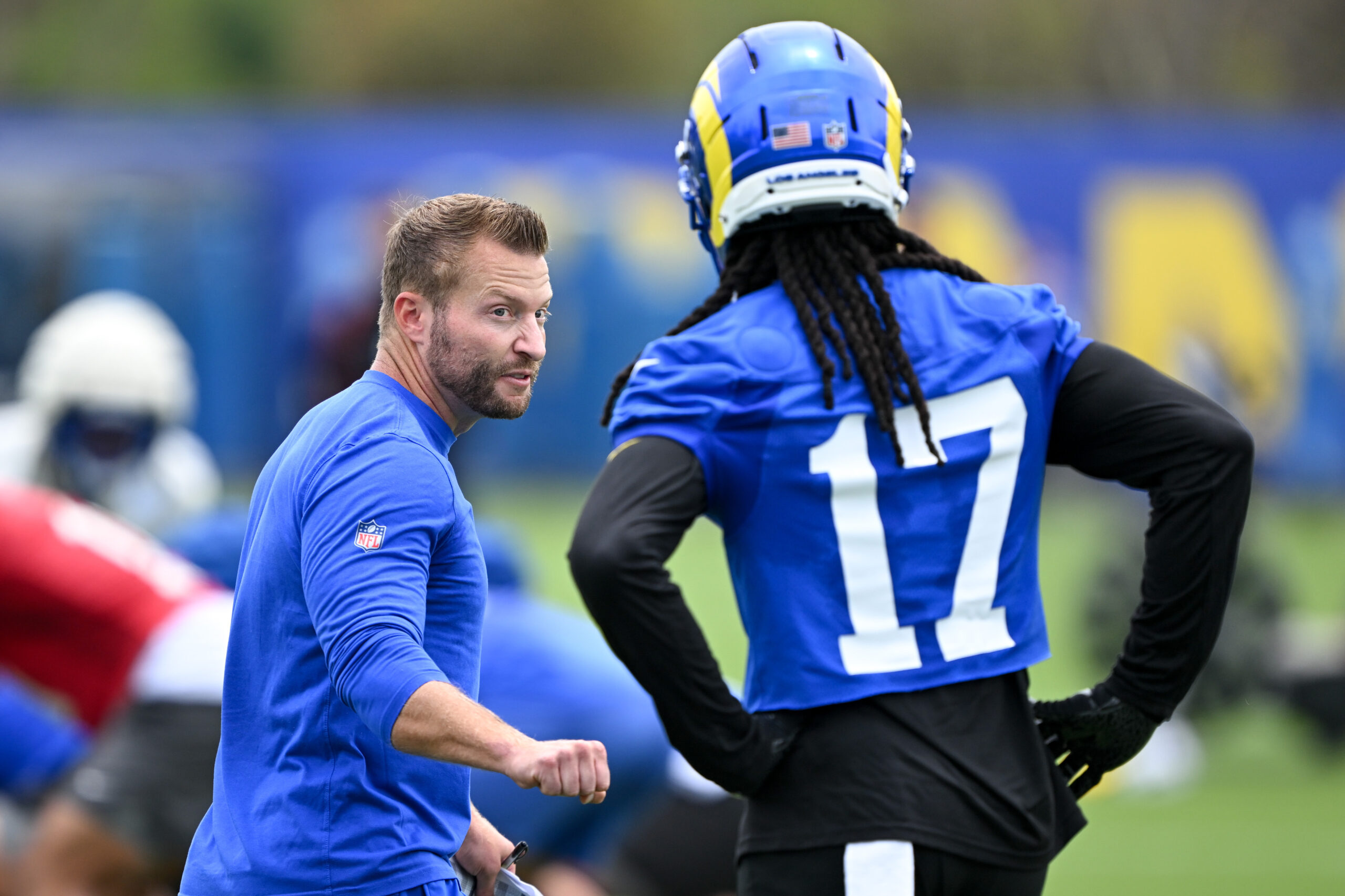 Rams head coach Sean McVay talks to wide receiver Davante...