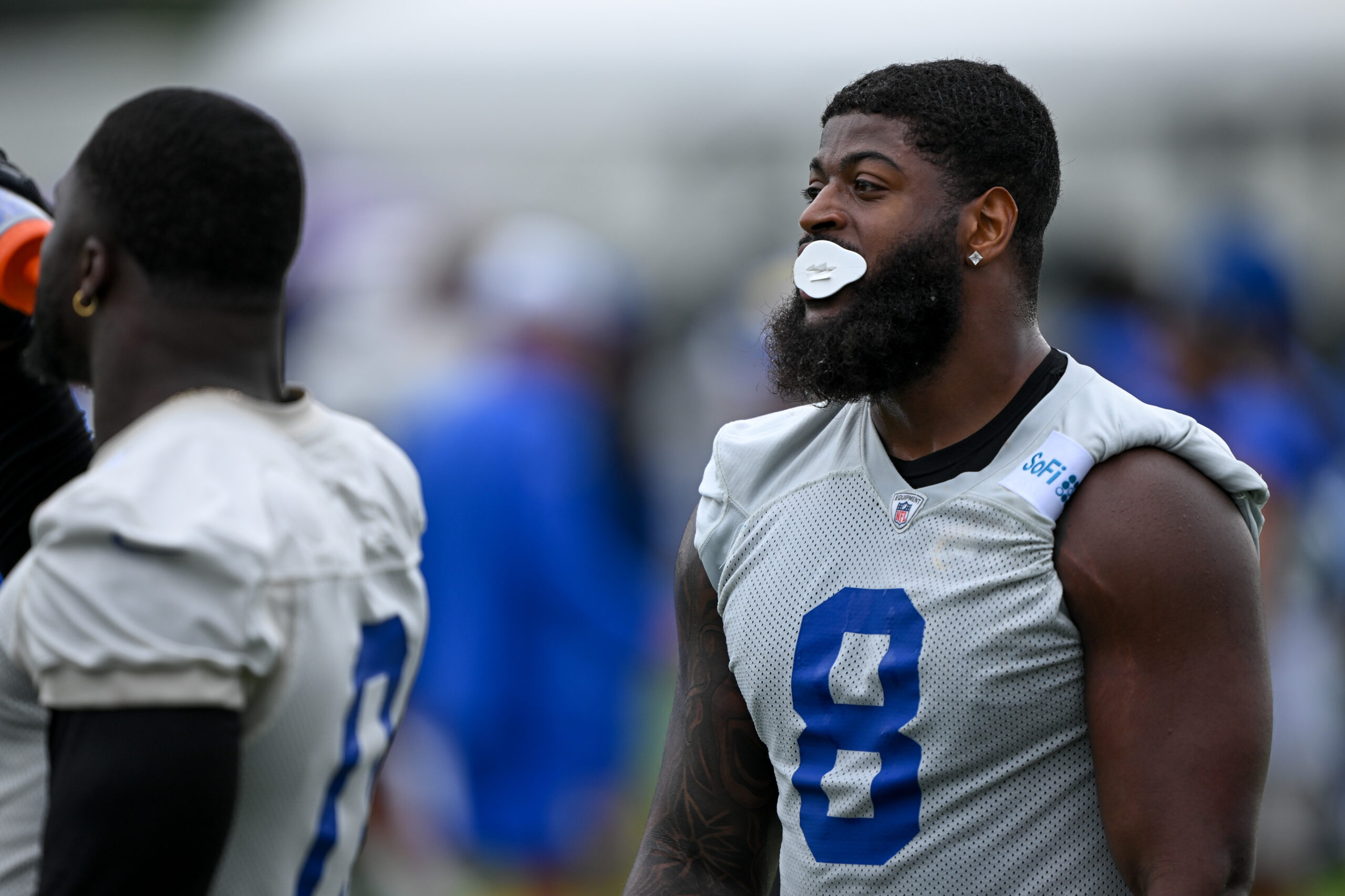 Rams linebacker Jared Verse looks on during an OTA workout...