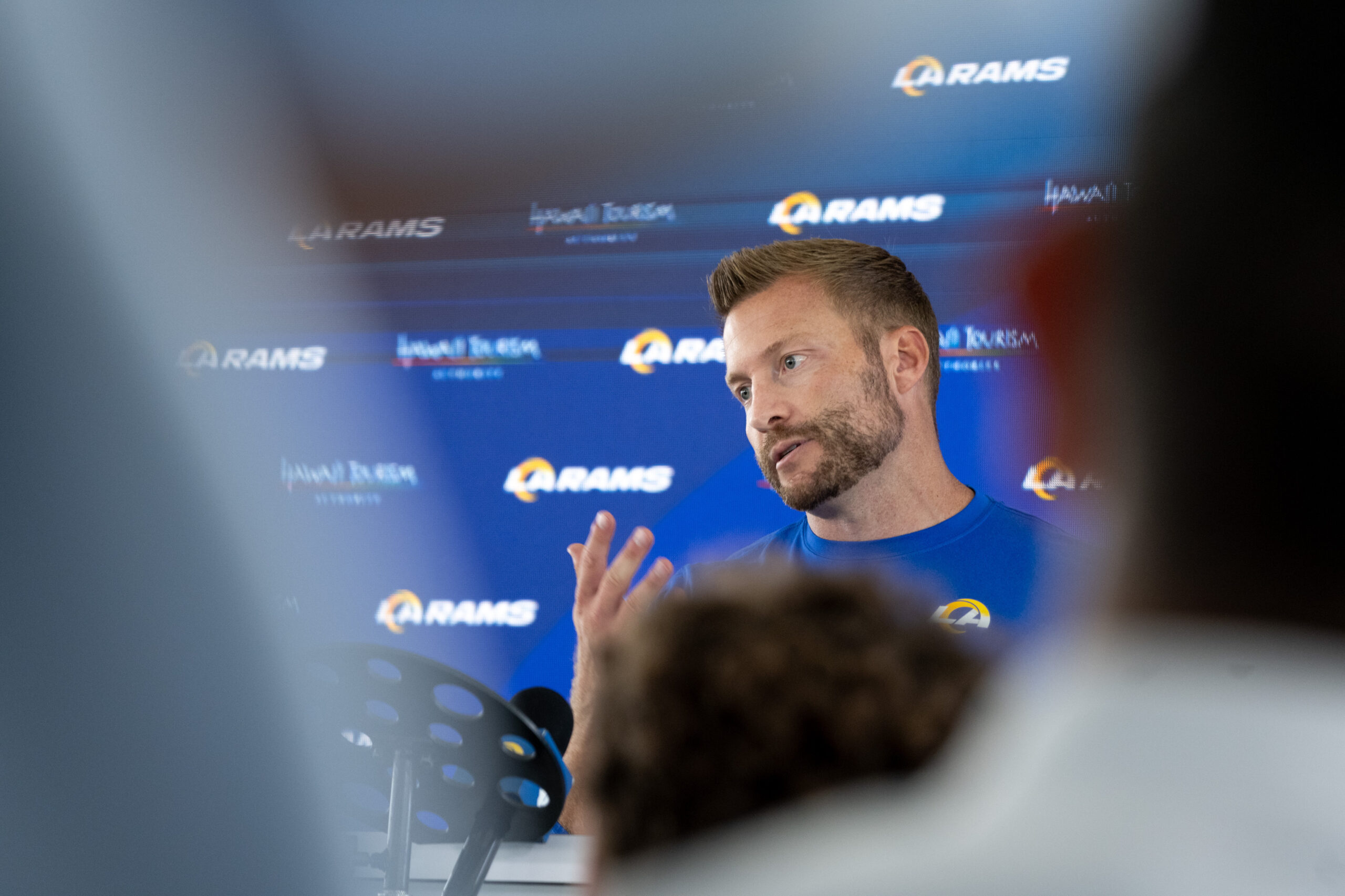 Rams head coach Sean McVay talks to reporters during an...