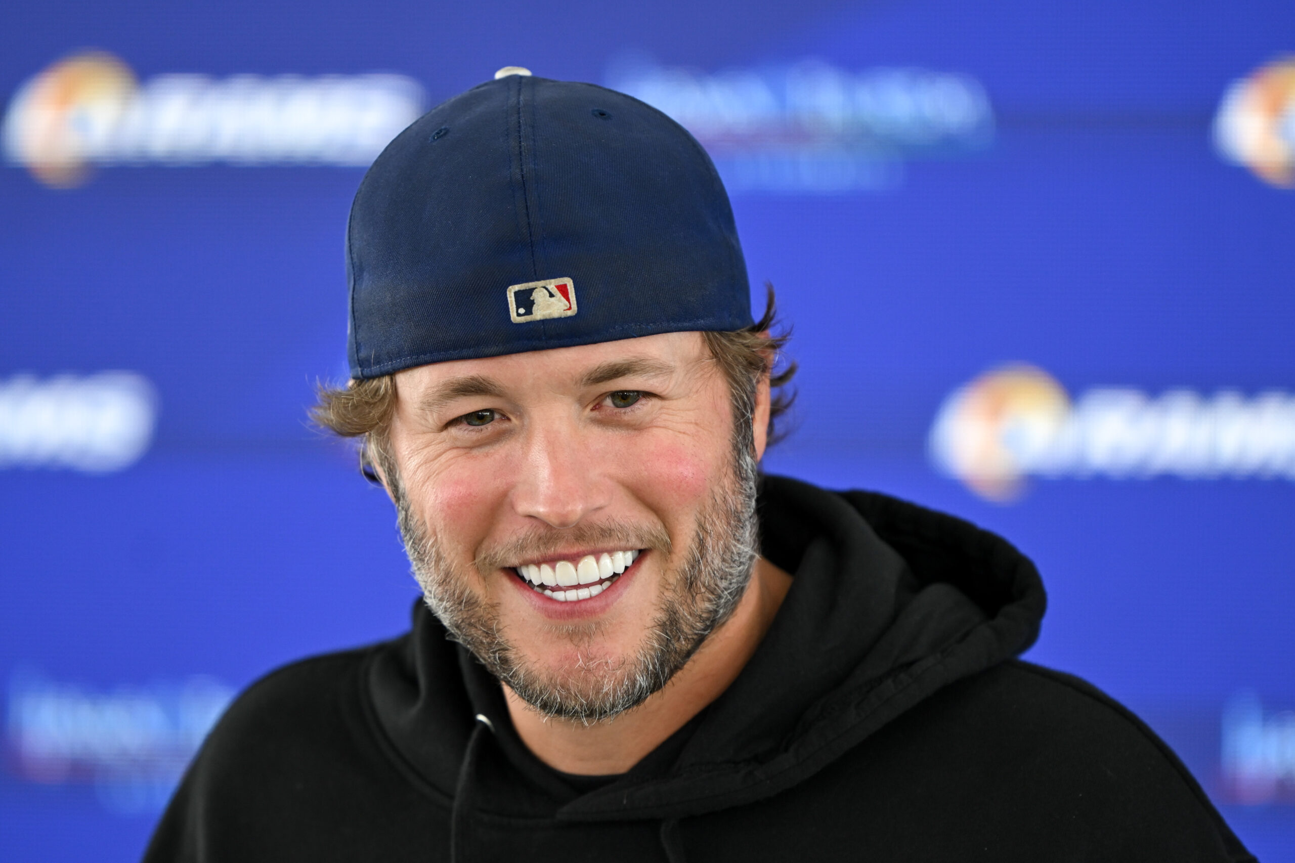 Rams quarterback Matthew Stafford talks to reporters during an OTA...