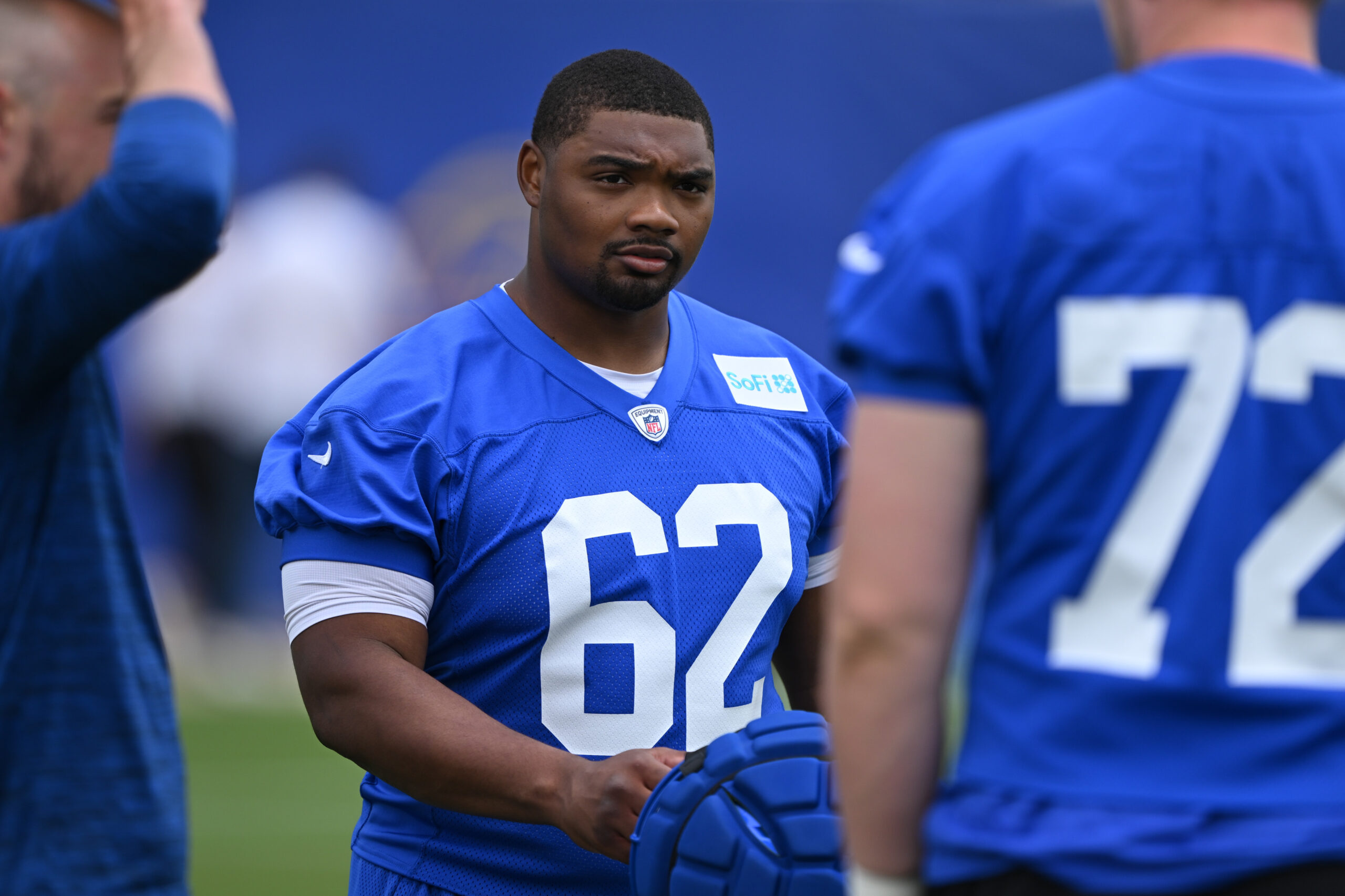 Rams guard Willie Lampkin prepares to go through drills during...