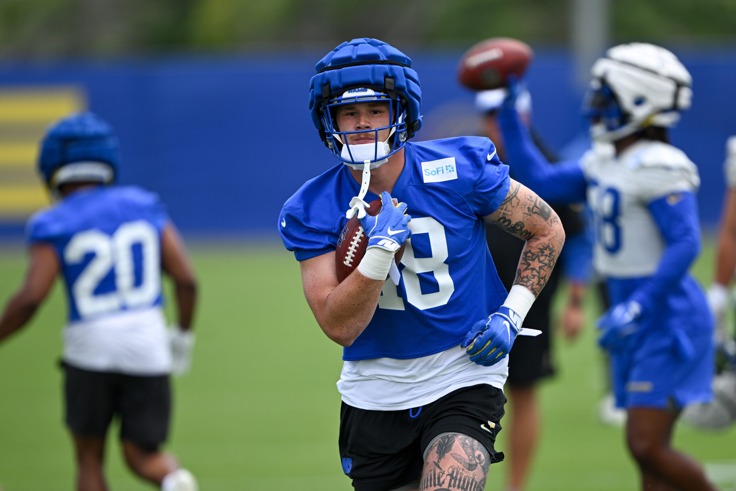 Rams tight end Terrance Ferguson goes through drills during an...
