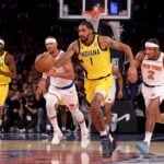 Oct 25, 2024; New York, New York, USA; Indiana Pacers forward Obi Toppin (1) brings the ball up court against New York Knicks guards Josh Hart (3) and Miles McBride (2) during the second quarter at Madison Square Garden. Mandatory Credit: Brad Penner-Imagn Images