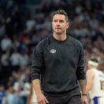 Apr 27, 2025; Minneapolis, Minnesota, USA; Los Angeles Lakers head coach JJ Redick reacts to his team losing the lead to the Minnesota Timberwolves late in the fourth quarter during game four of first round for the 2025 NBA Playoffs at Target Center. Mandatory Credit: Matt Blewett-Imagn Images