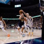 May 11, 2025; Denver, Colorado, USA; Denver Nuggets center Nikola Jokic (15) and Oklahoma City Thunder guard Alex Caruso (9) battle for a loose ball as forward Jalen Williams (8) and referee Sean Wright (4) look on in the fourth quarter during game four of the second round of the 2025 NBA Playoffs at Ball Arena. Mandatory Credit: Isaiah J. Downing-Imagn Images