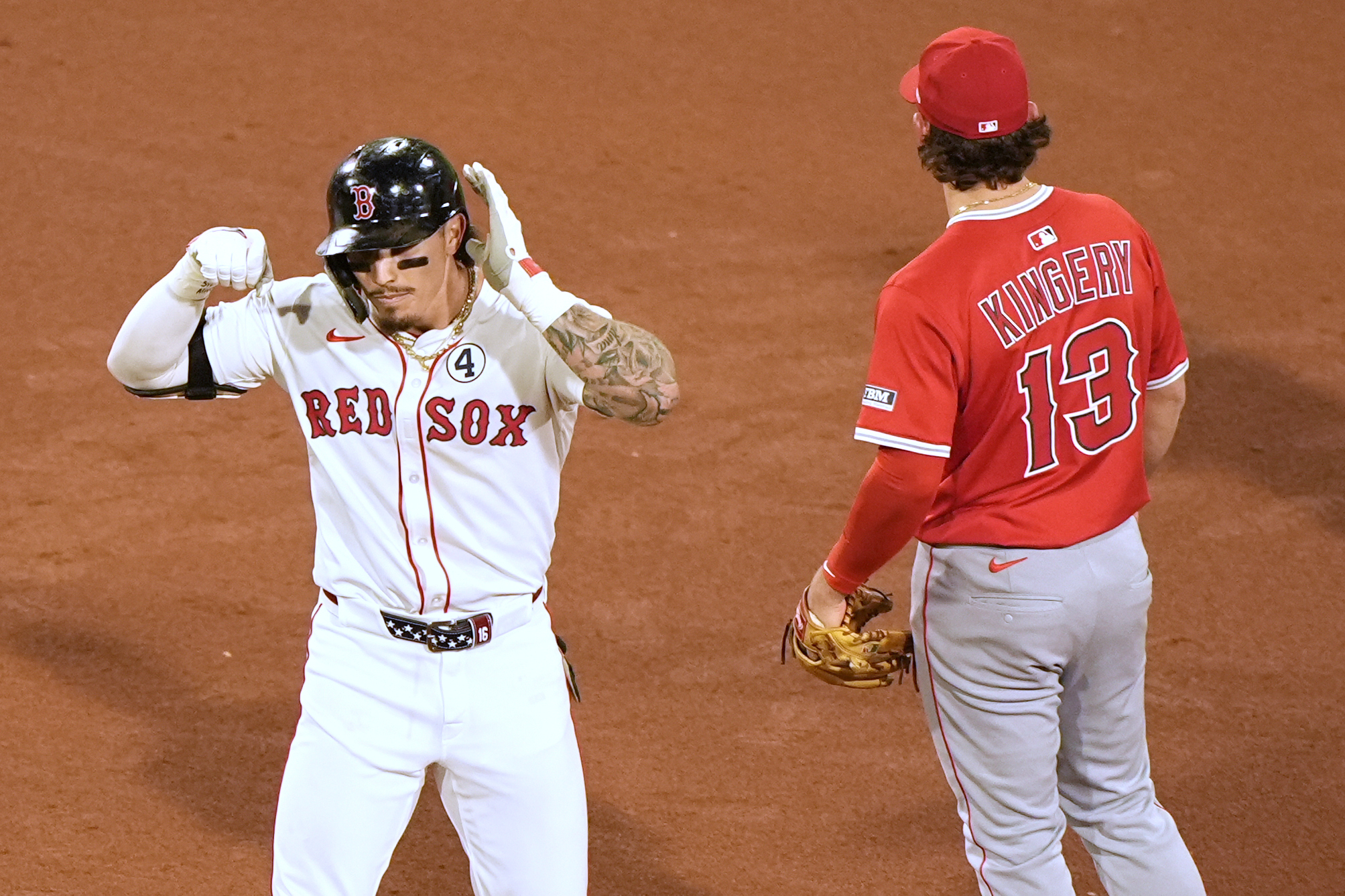 The Boston Red Sox’s Jarren Duran gestures to his dugout...