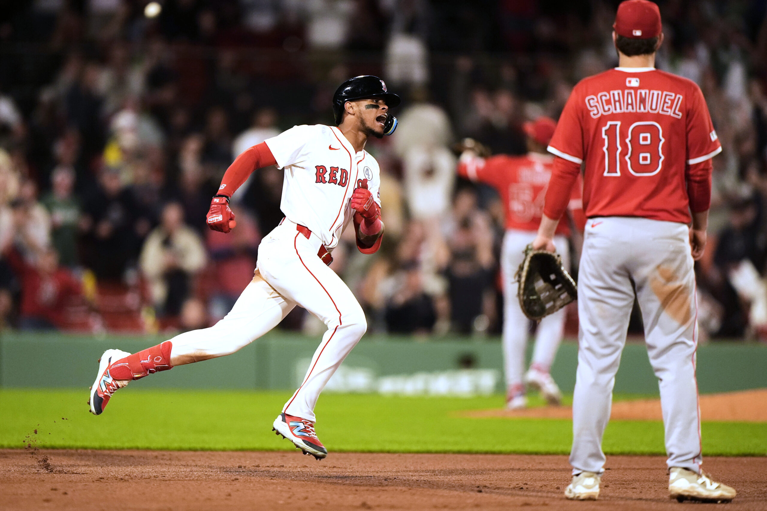 The Boston Red Sox’s Ceddanne Rafaela celebrates as he runs...