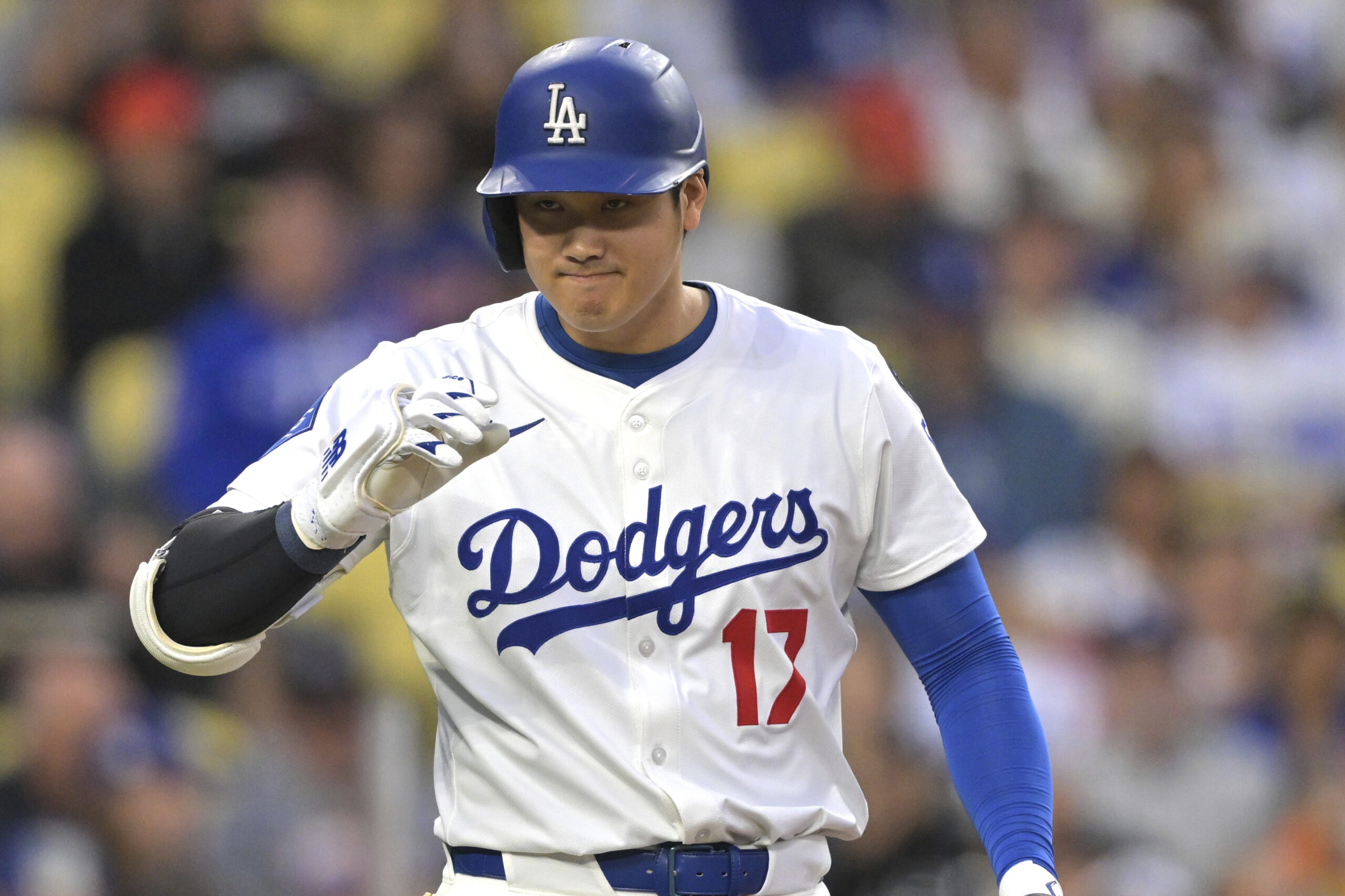 Dodgers star Shohei Ohtani acknowledges the Mets’ dugout as he...