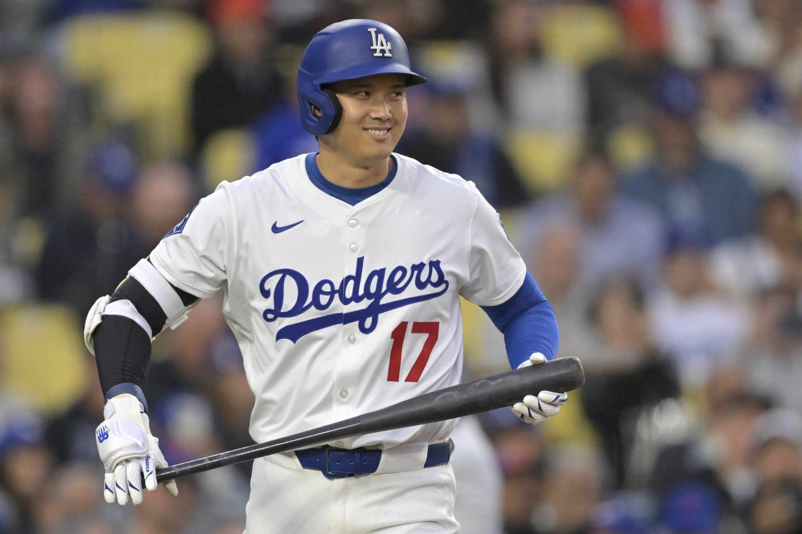 Dodgers star Shohei Ohtani approaches the plate for his first...