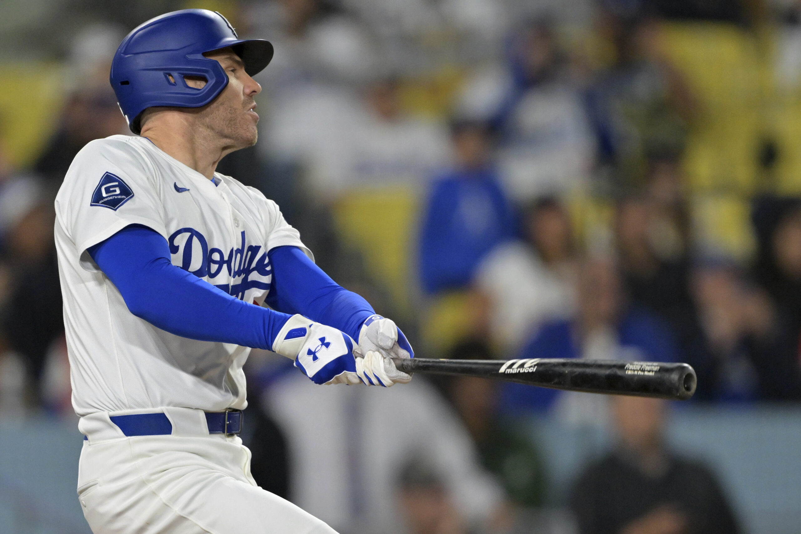 The Dodgers’ Freddie Freeman hits a walk-off RBI double during...
