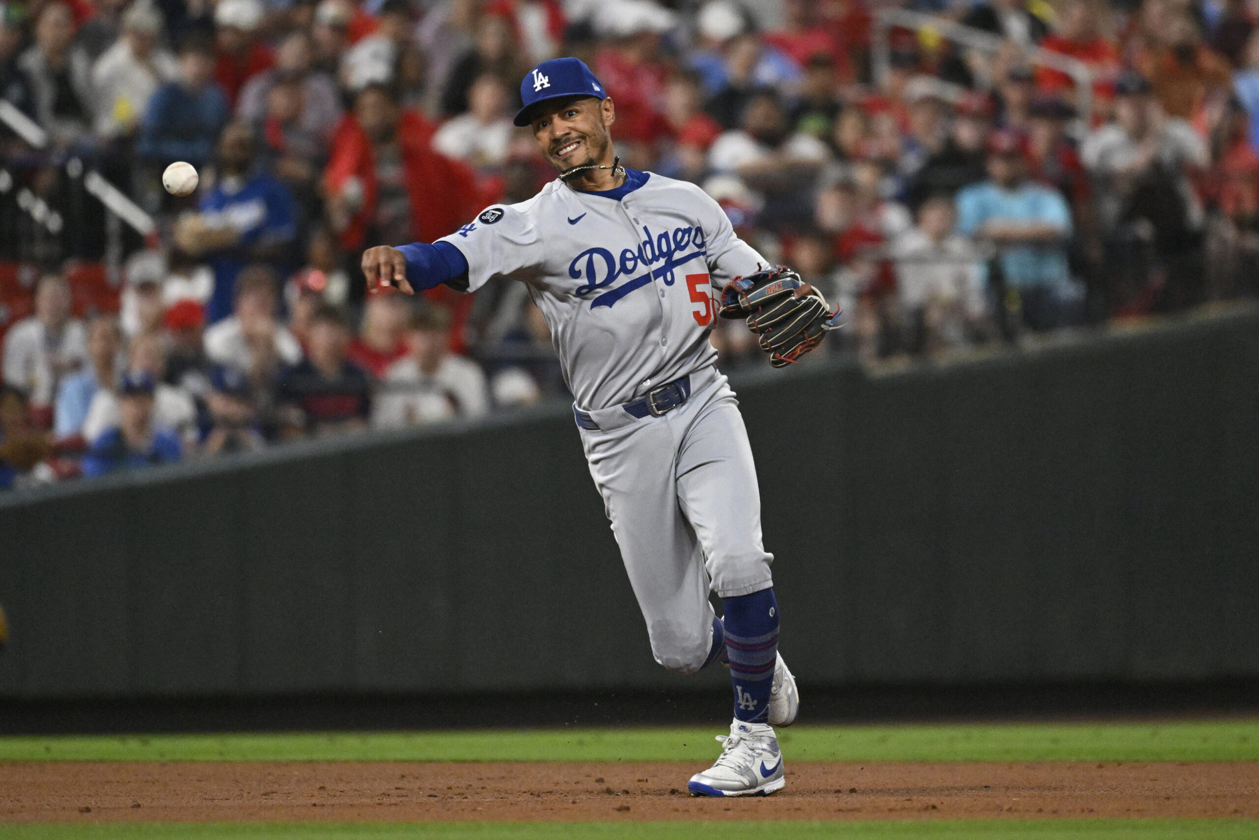 Dodgers shortstop Mookie Betts throws out the St. Louis Cardinals’...