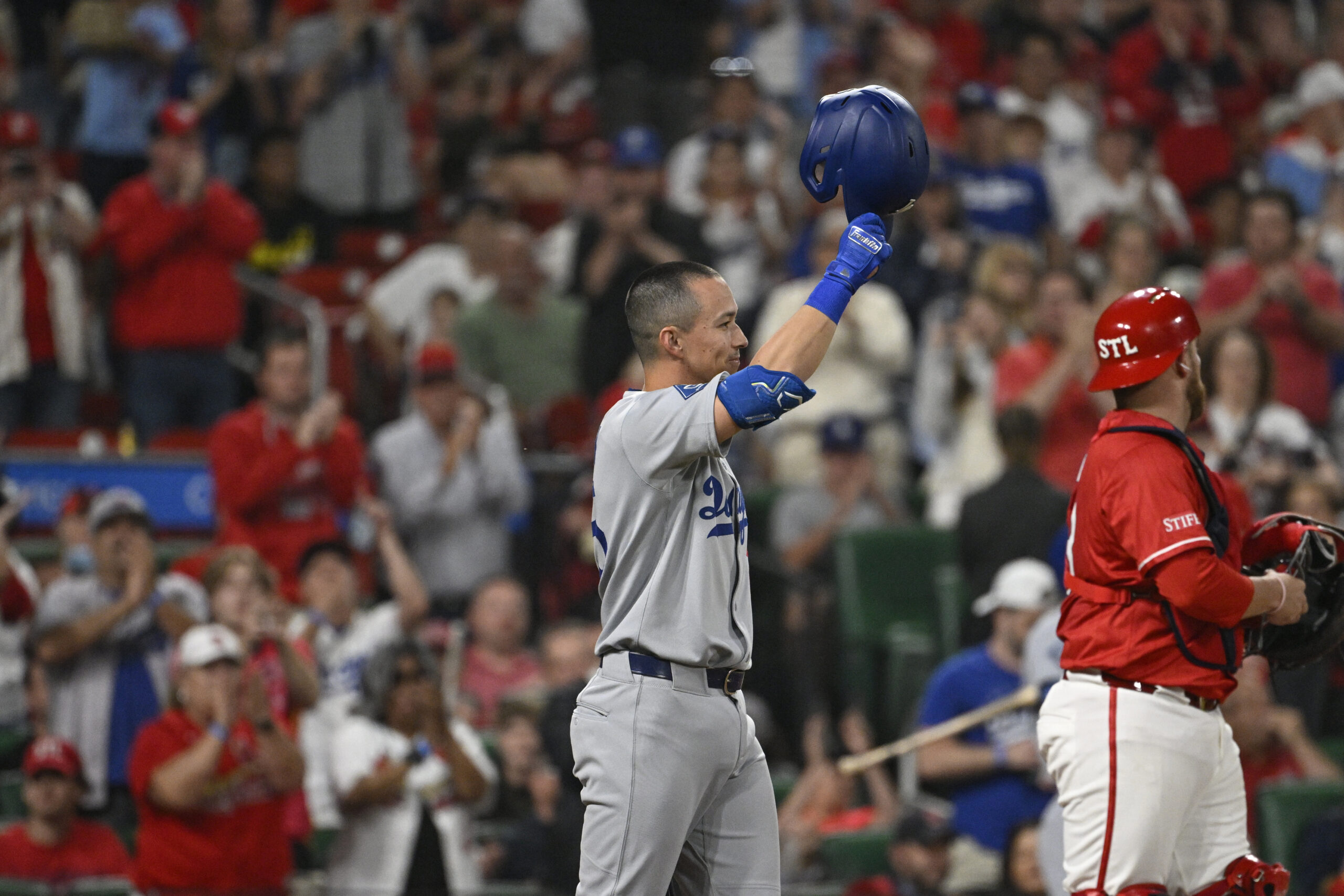 The Dodgers’ Tommy Edman receives a standing ovation in his...