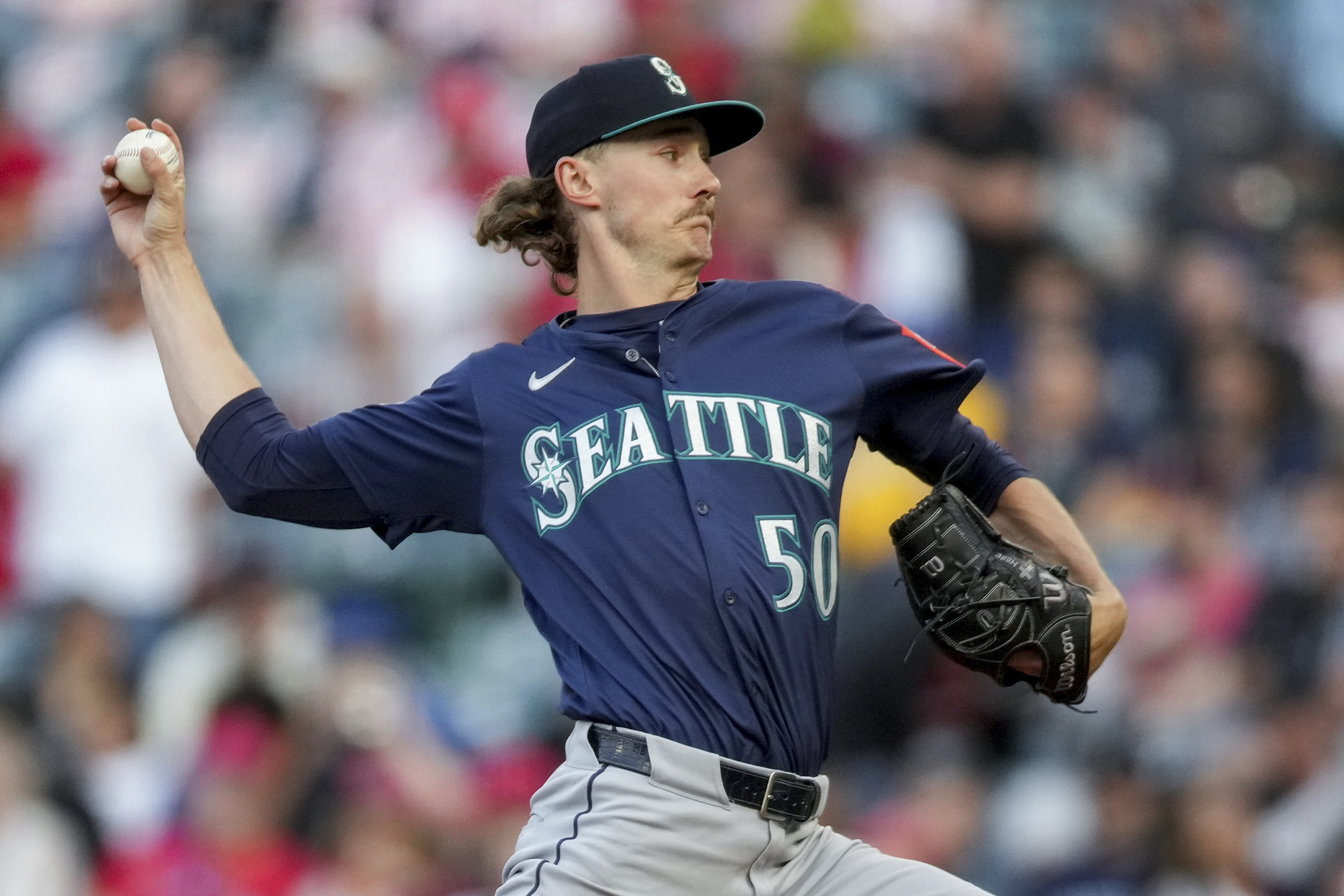 Seattle Mariners starting pitcher Bryce Miller delivers during the first...